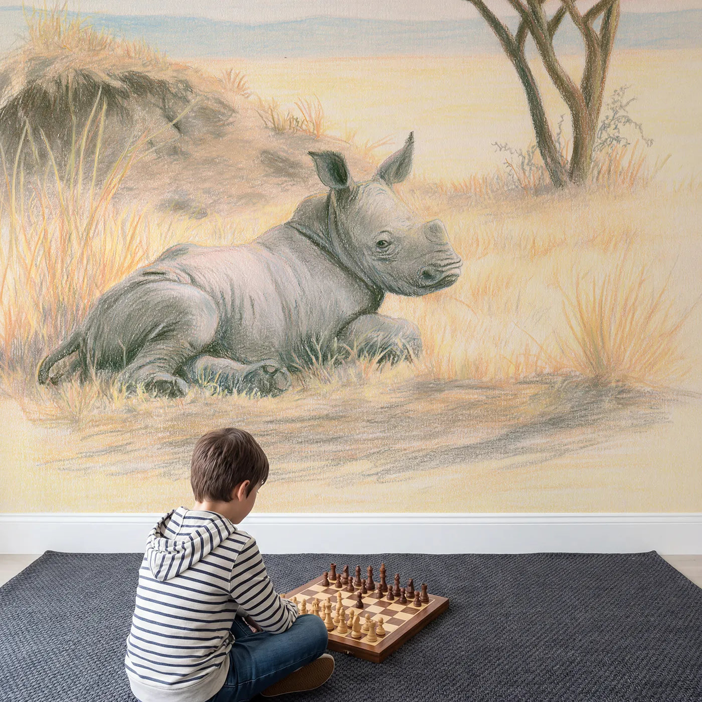 Child in nursery with Rhino Calf at Rest Wallpaper Mural by Whimsy Tots