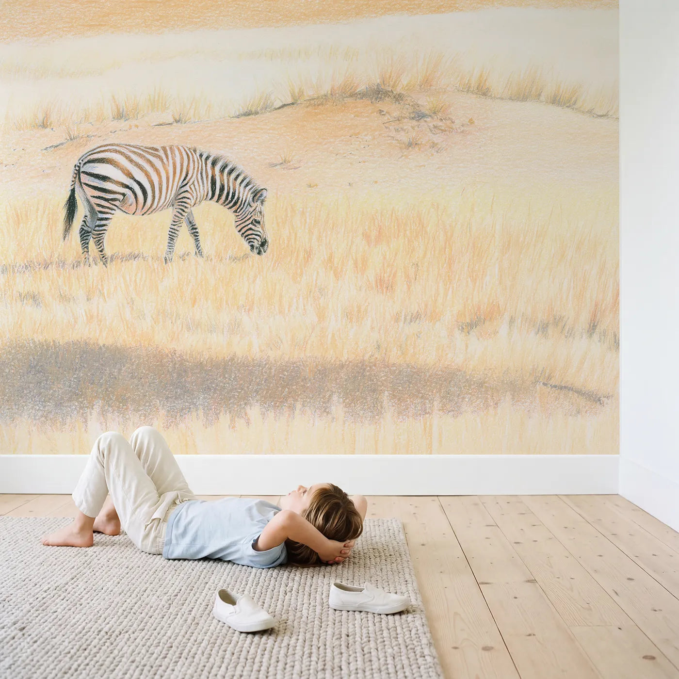 Child in nursery with Grazing Zebra Wallpaper Mural by Whimsy Tots