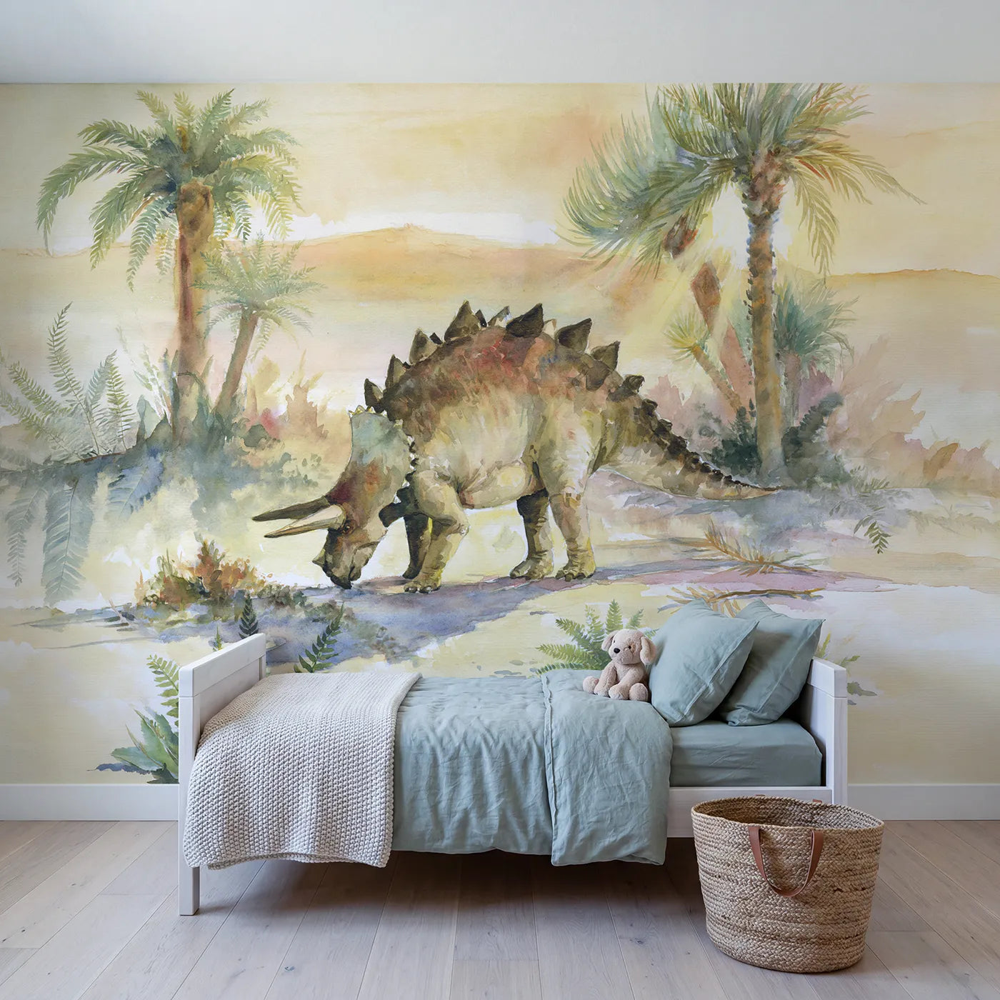 Watercolor wall mural of a grazing stegosaurus by Whimsy Tots
