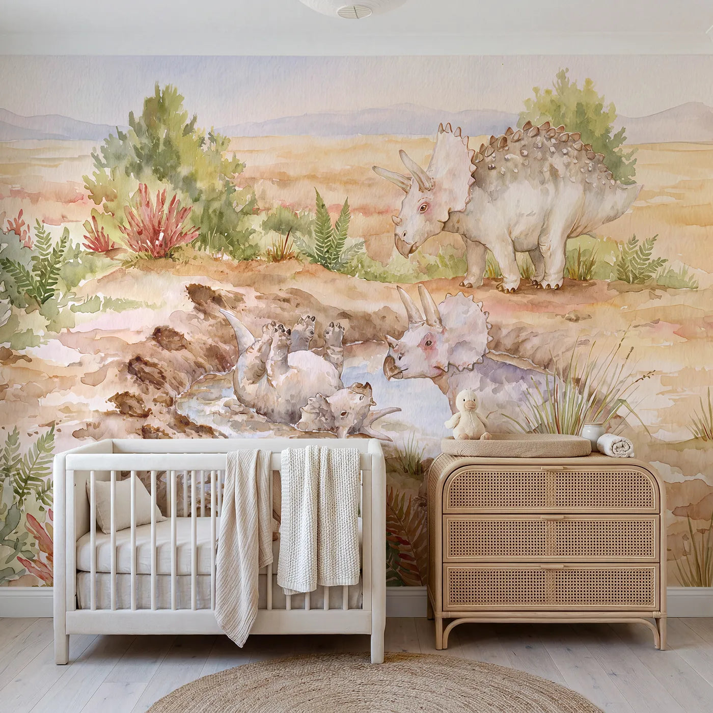 Watercolor triceratops rolling in a mud wallow, wall mural for a playroom by Whimsy Tots