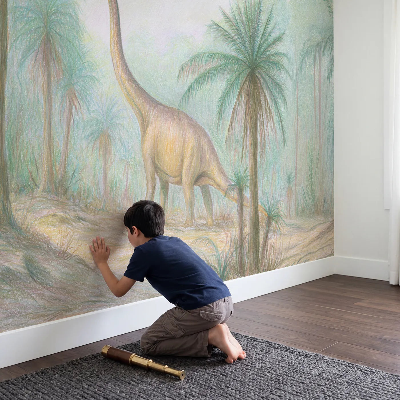 Child in nursery with Tall Brachiosaurus Wallpaper Mural by Whimsy Tots