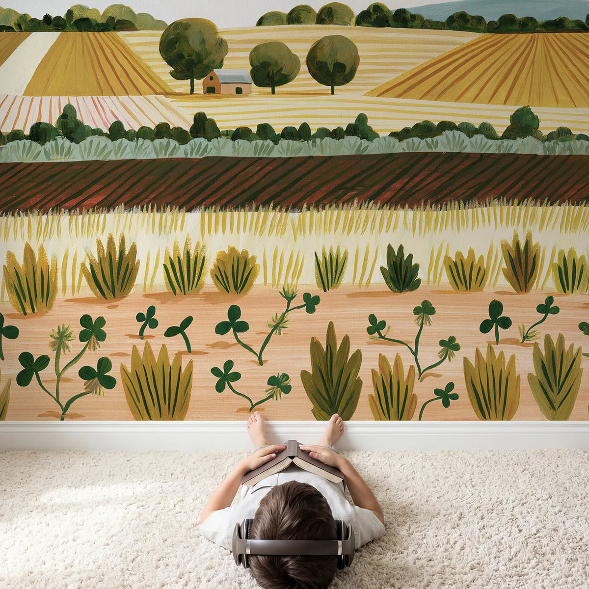 Child in nursery with Folk Country Hills Wallpaper Mural by Whimsy Tots