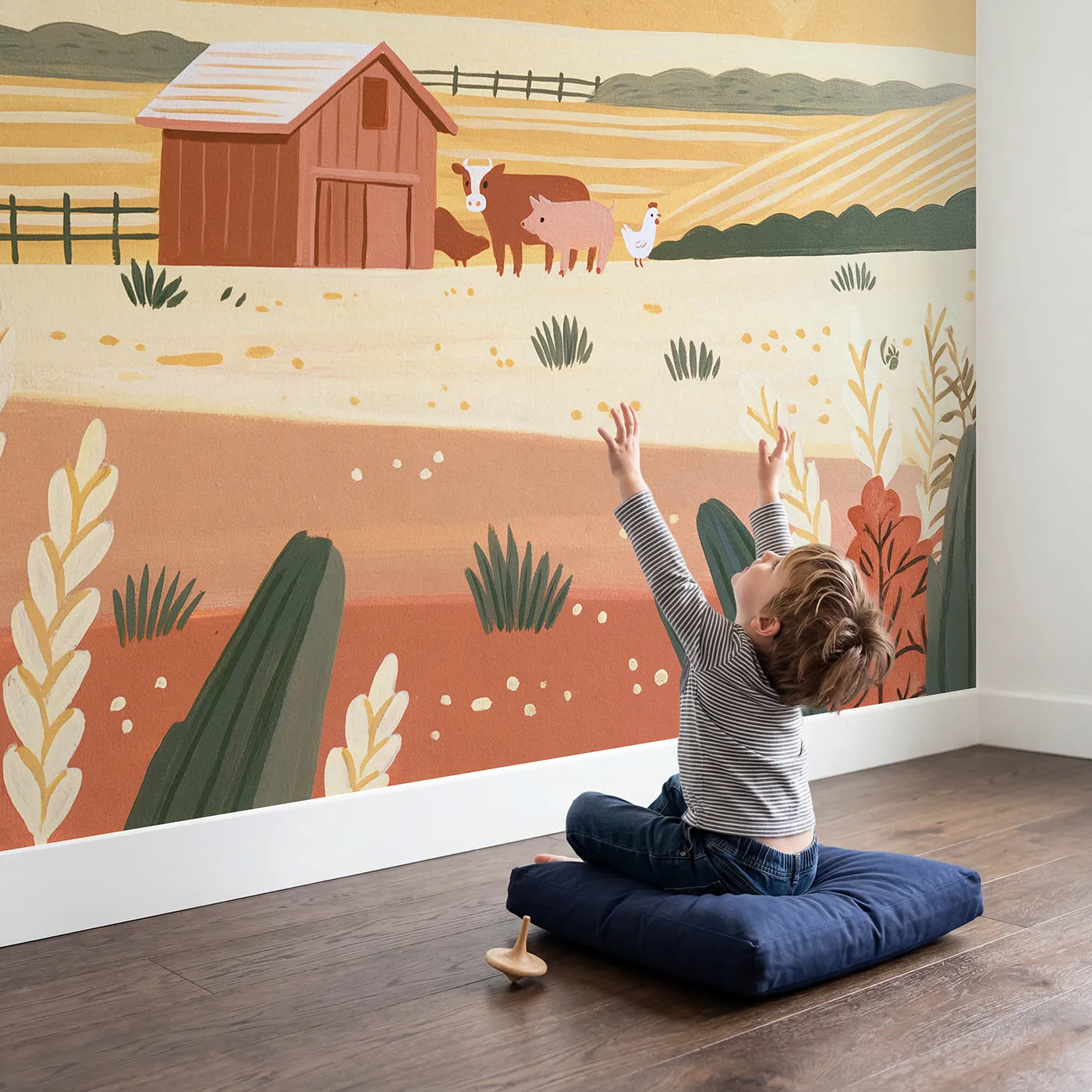 Child in nursery with Folk Barn Scene Wallpaper Mural by Whimsy Tots