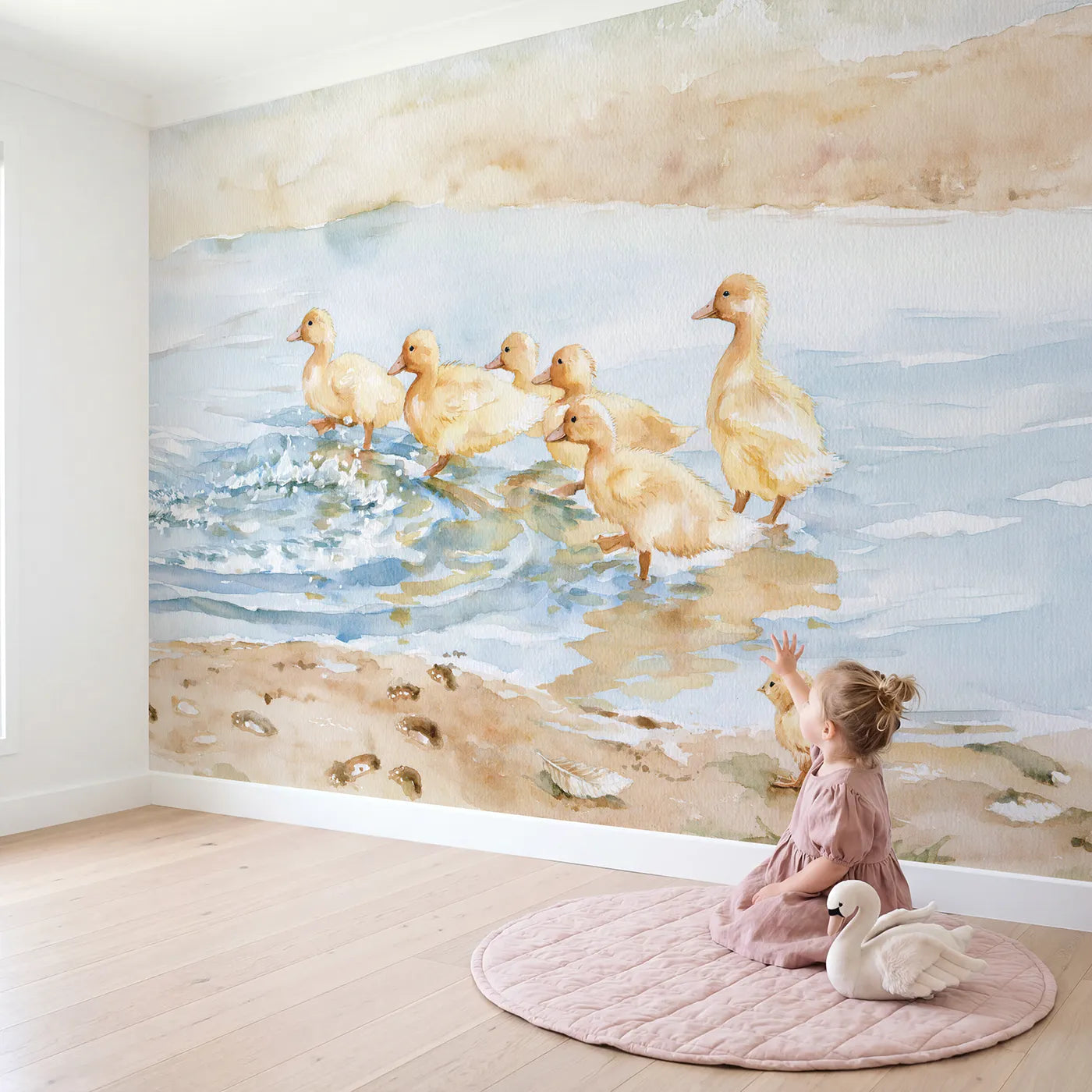 Child in nursery with The Puddle Parade Wallpaper Mural by Whimsy Tots