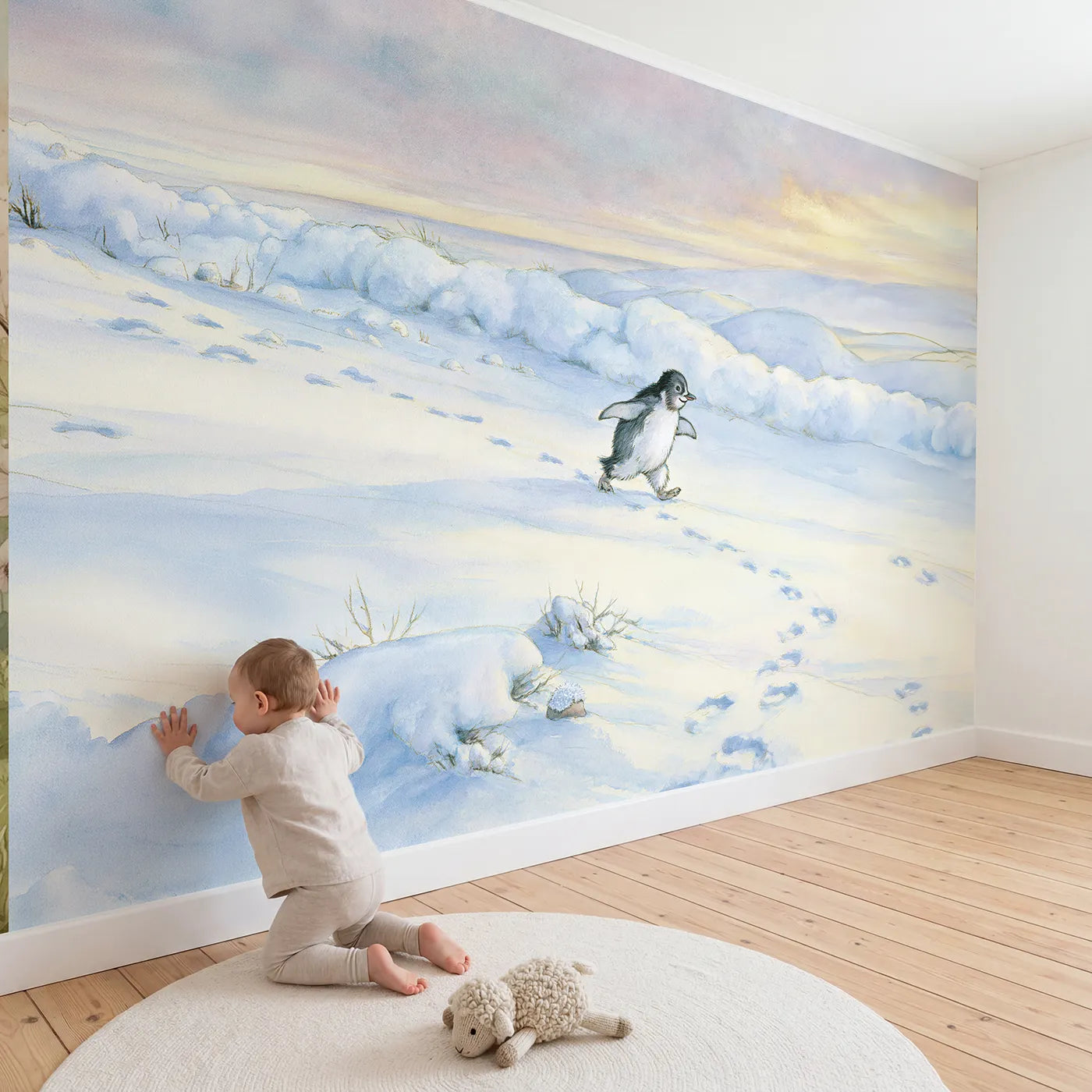 Child in nursery with Friendly Penguin Waddle Wallpaper Mural by Whimsy Tots