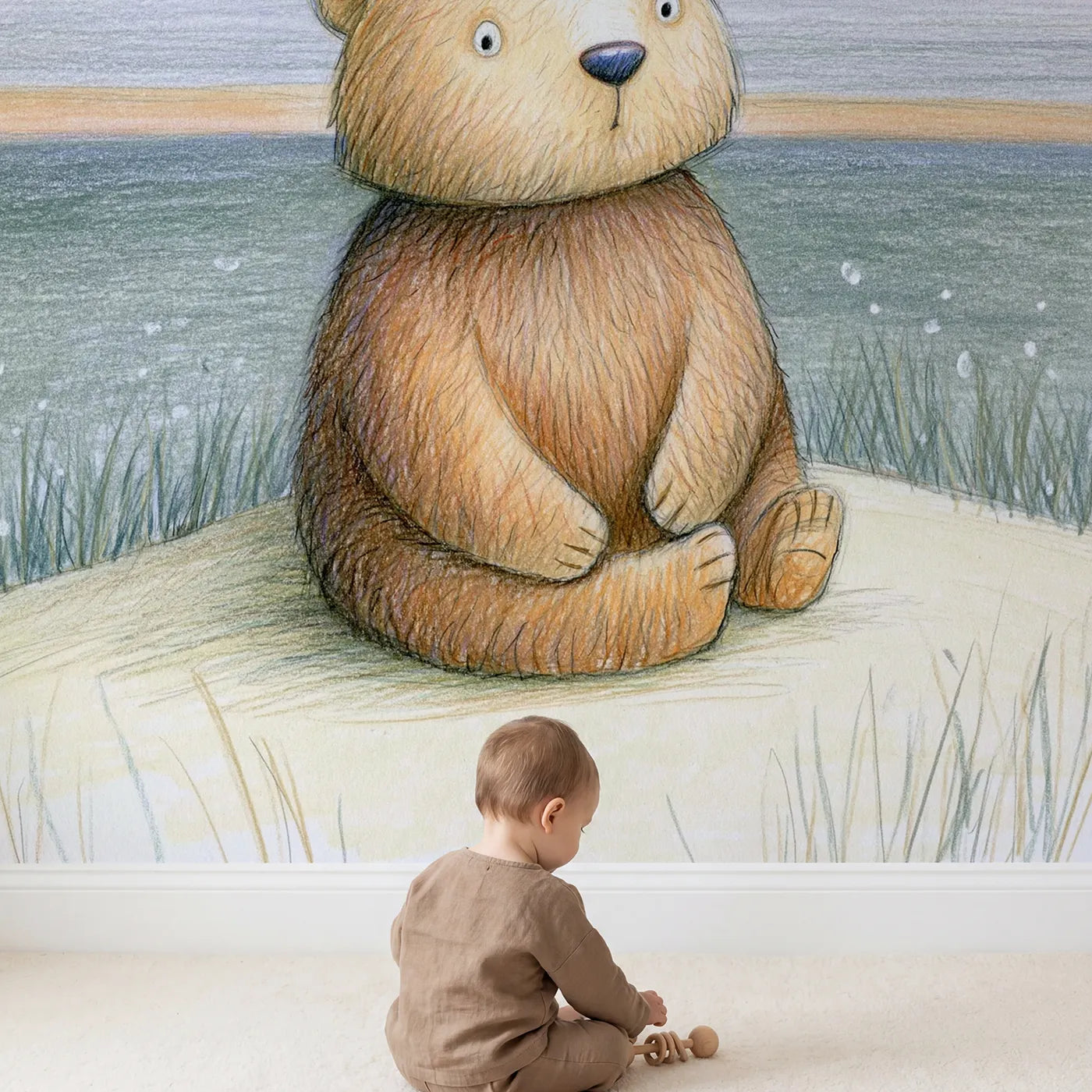 Child in nursery with Cosy Pencil Cub Wallpaper Mural by Whimsy Tots