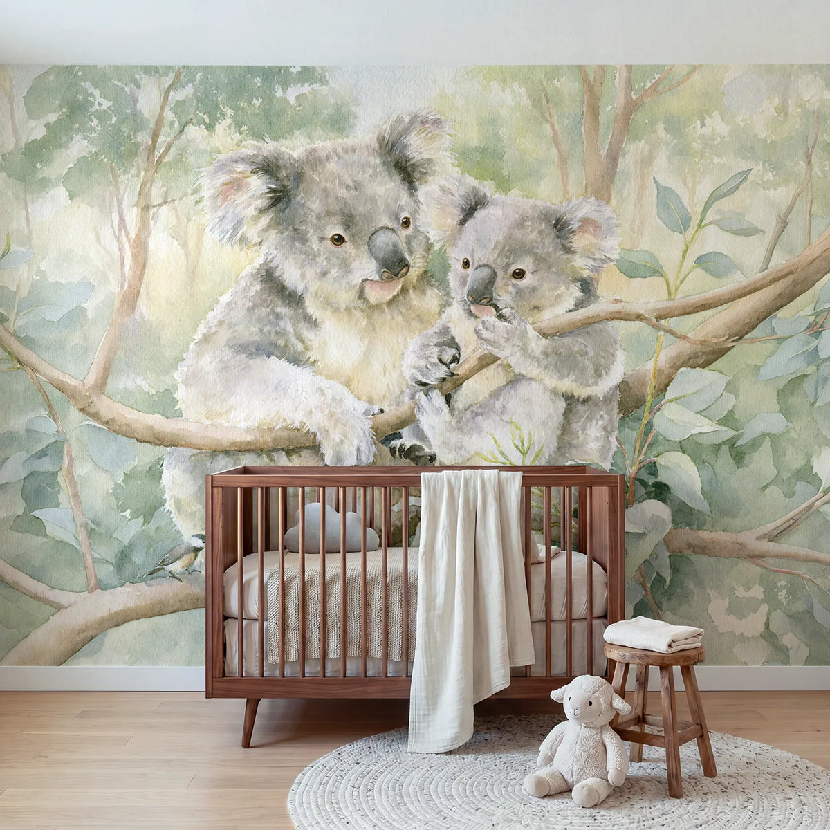 Watercolor koala mother teaching her joey to grip, wall mural for a toddler room by Whimsy Tots