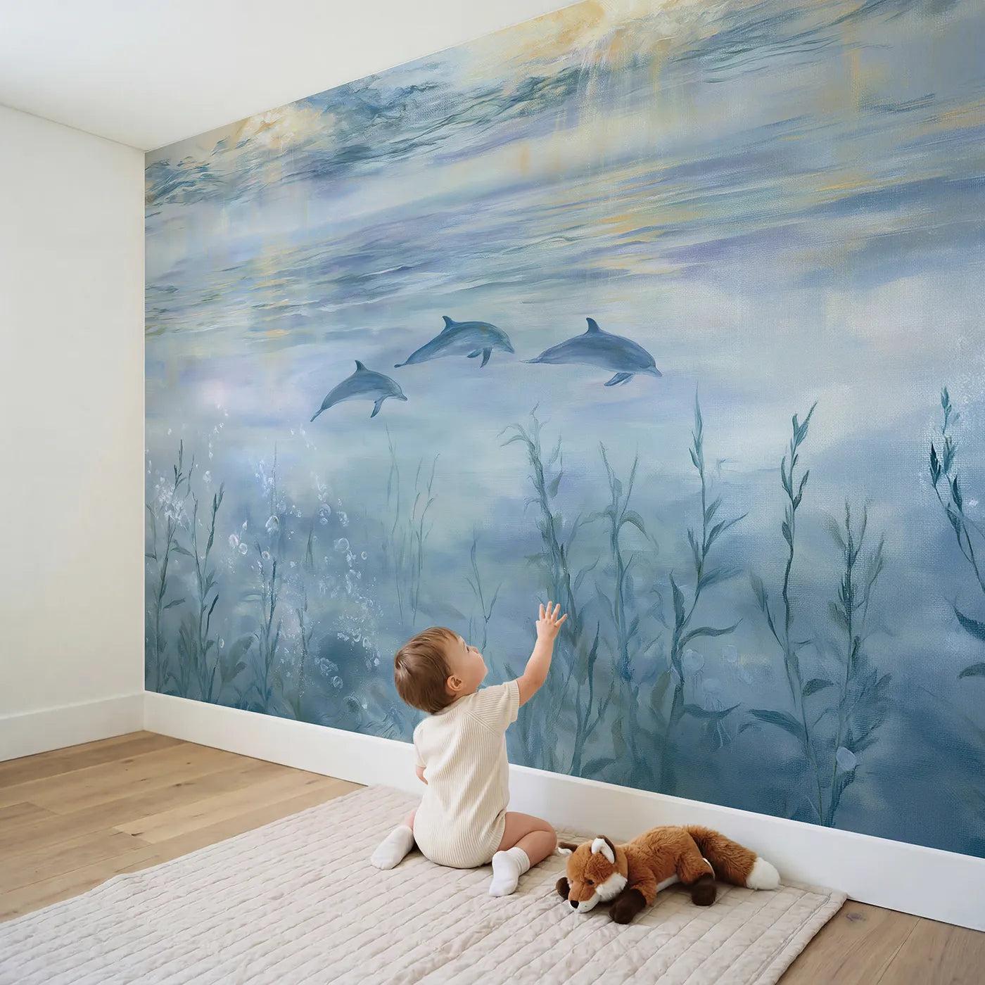 Child in nursery with Dolphin Pod Dawn Wallpaper Mural by Whimsy Tots