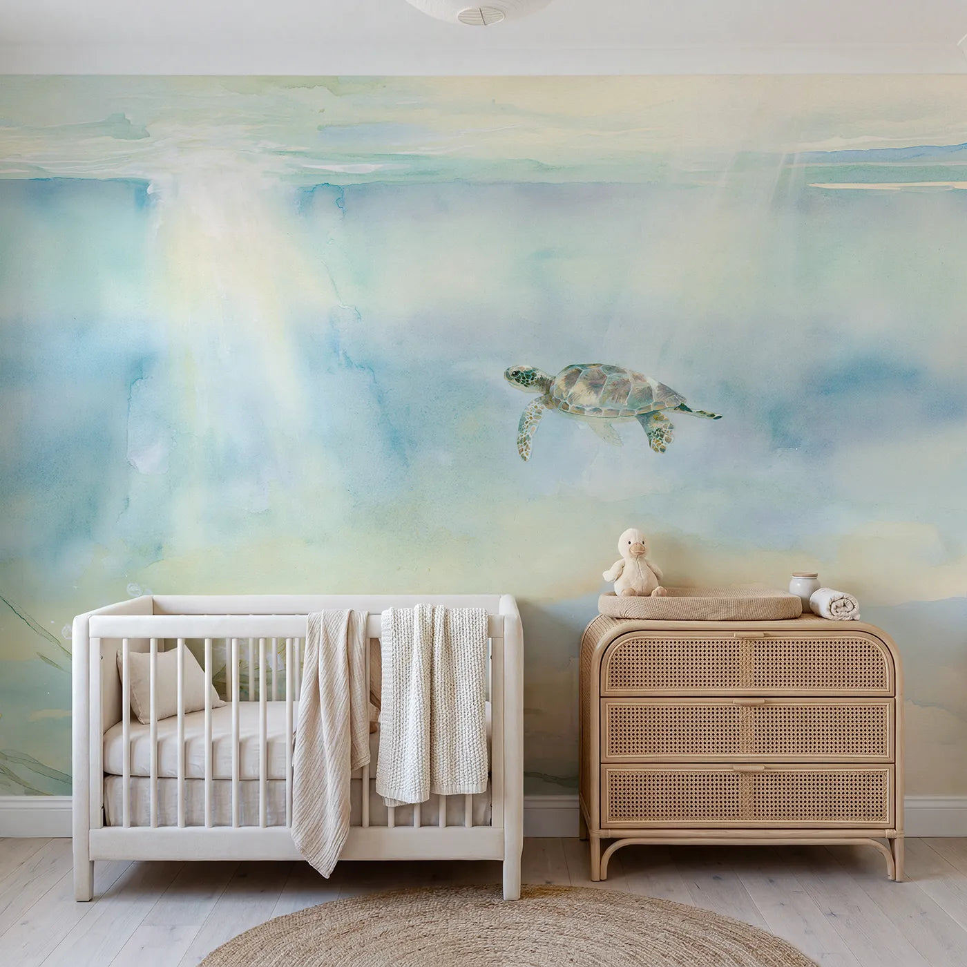 Watercolor wall mural of a gliding sea turtle by Whimsy Tots