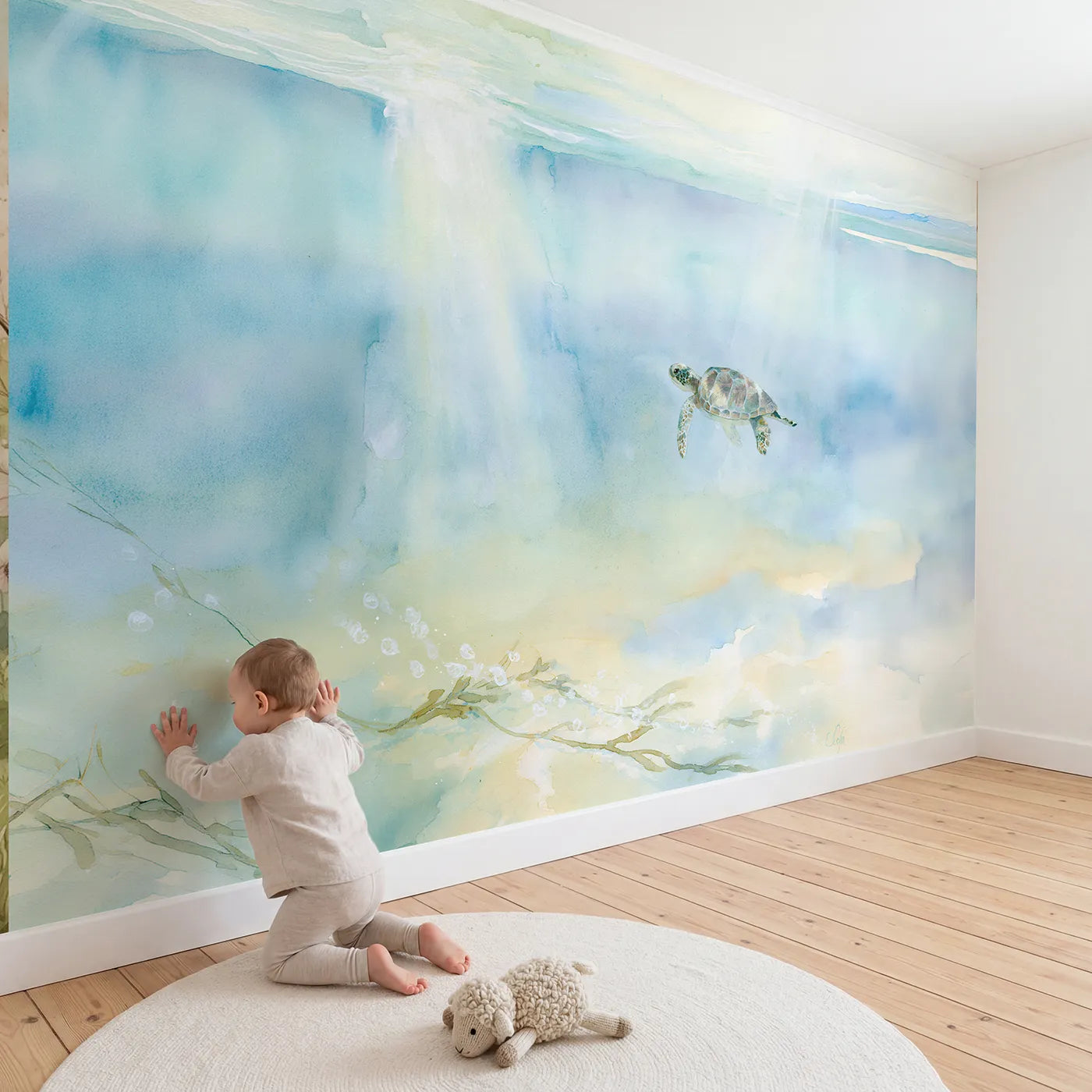 Child in nursery with Sea Turtle Glide Wallpaper Mural by Whimsy Tots