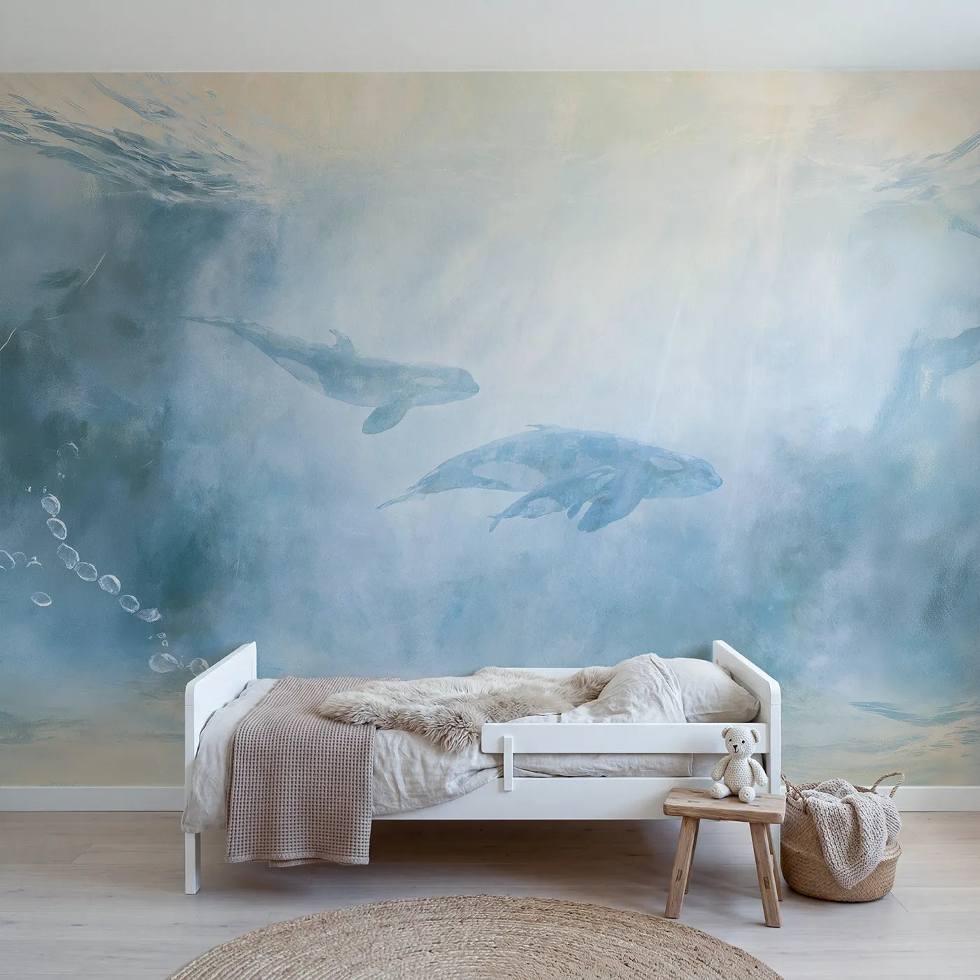 Watercolor wall mural of a whale and calf drifting by Whimsy Tots