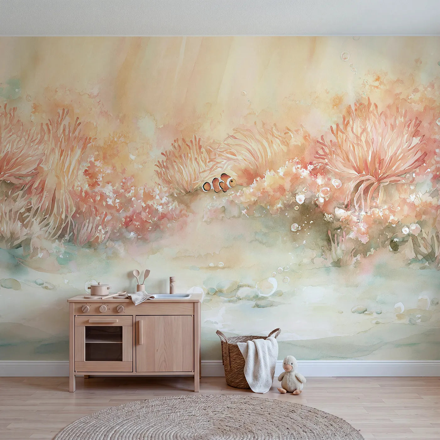 Watercolor wall mural of a clownfish in an anemone by Whimsy Tots