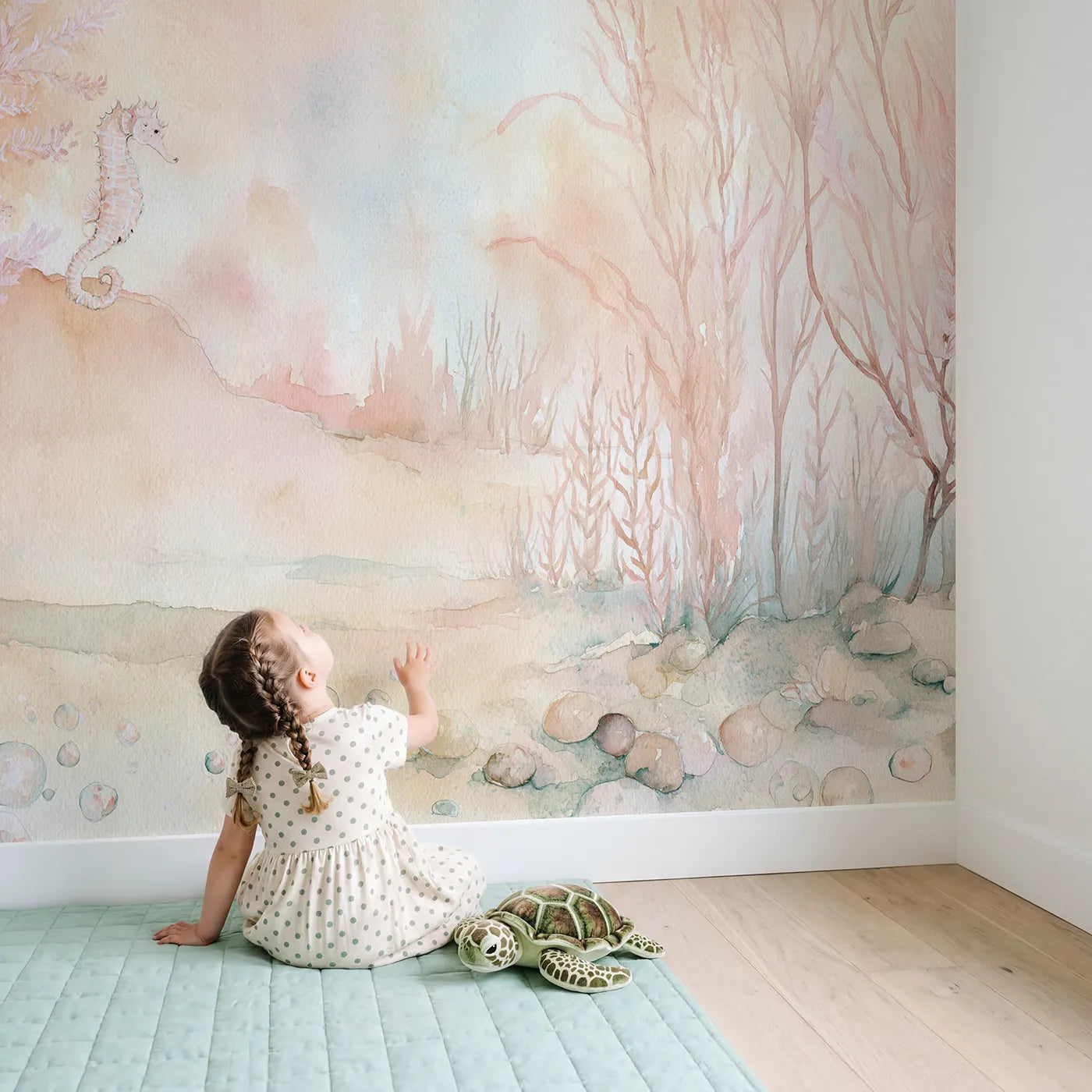 Child in nursery with Seahorse Reef Drift Wallpaper Mural by Whimsy Tots