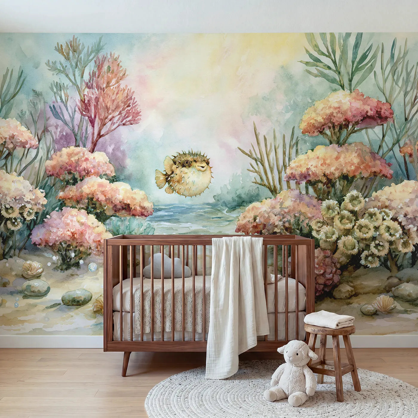 Watercolor wall mural of a round friendly pufferfish by Whimsy Tots