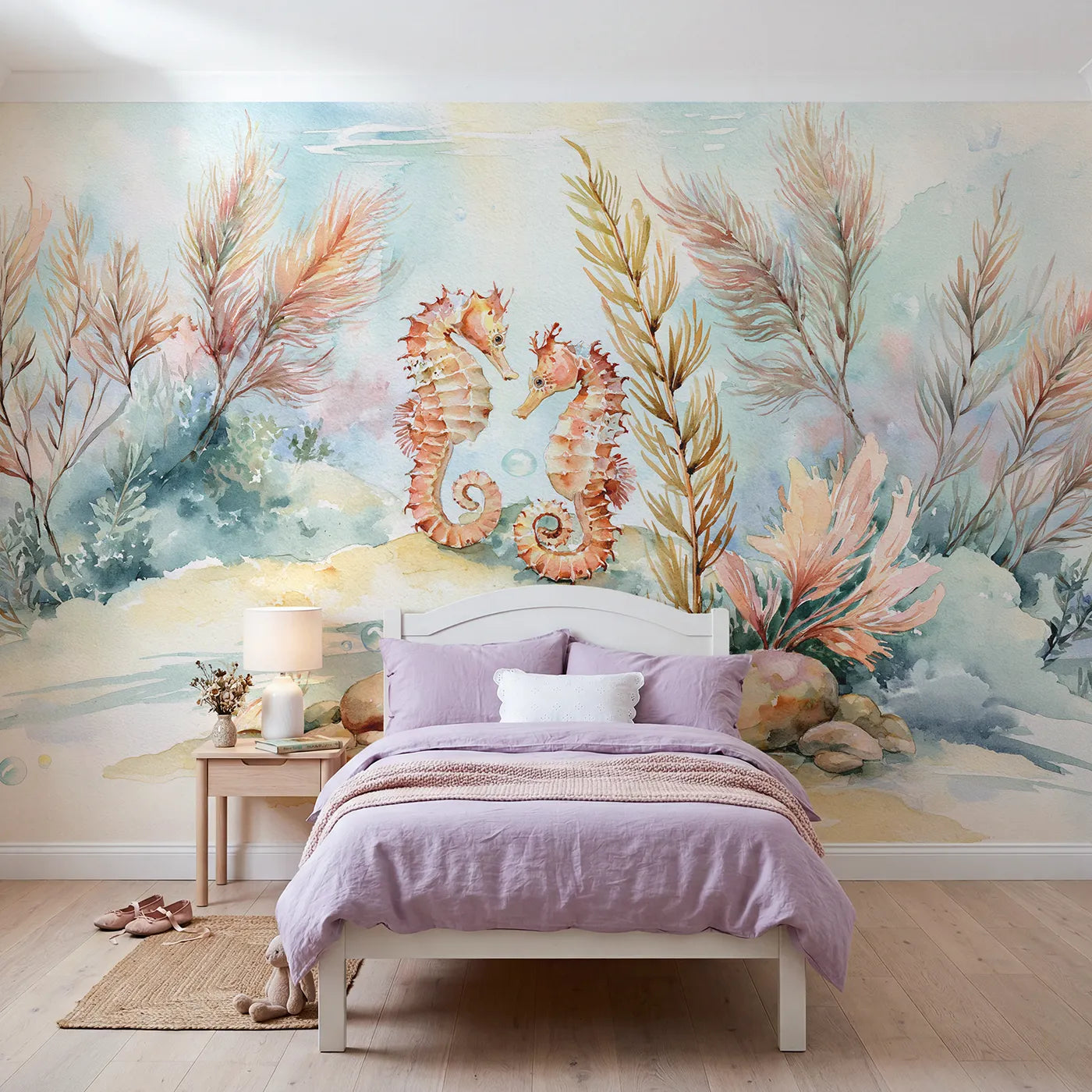 Watercolor wall mural of a seahorse pair with curled tails by Whimsy Tots