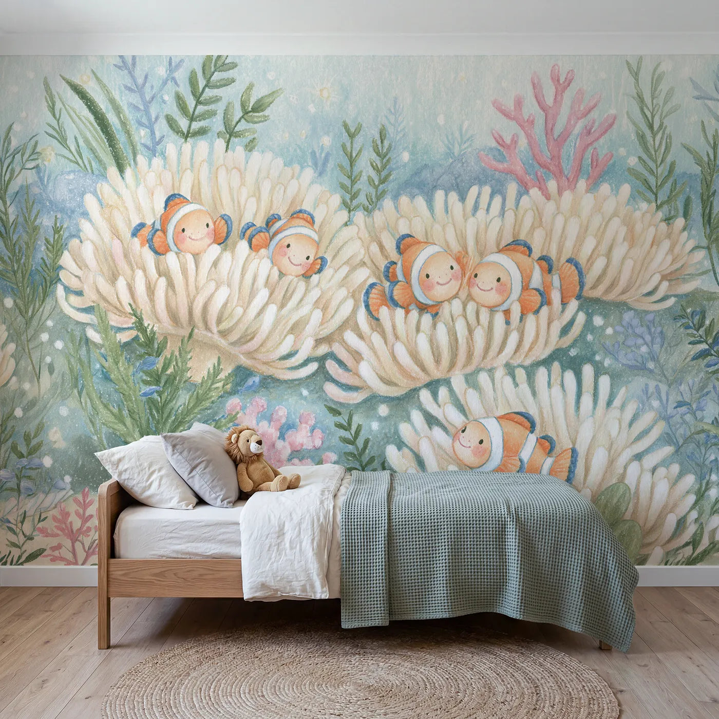 Colored Pencil fish sleepover in a soft anemone, wall mural for a shared kids room by Whimsy Tots