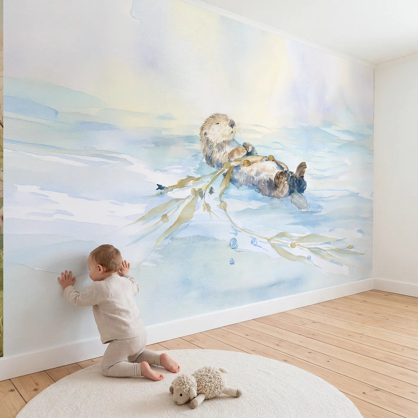 Child in nursery with Sea Otter Float Wallpaper Mural by Whimsy Tots