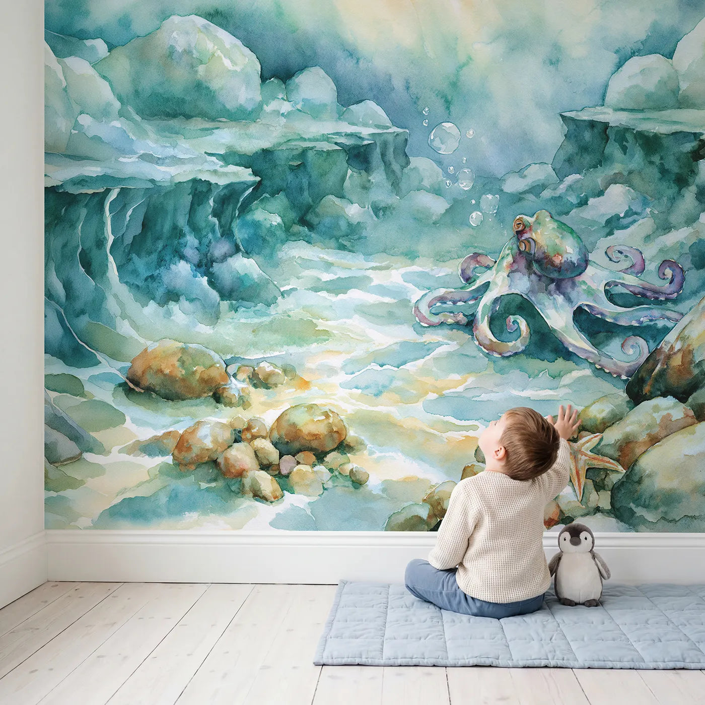 Child in nursery with Curious Octopus Seabed Wallpaper Mural by Whimsy Tots
