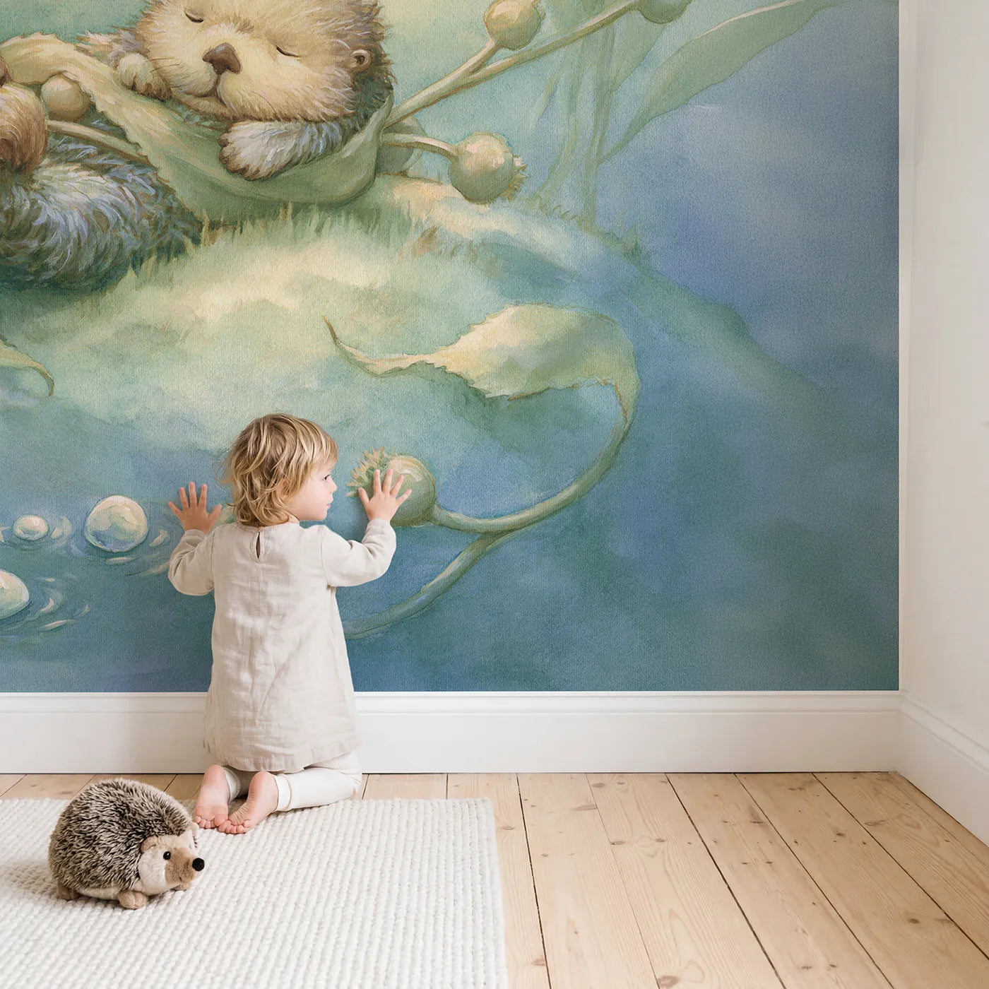 Child in nursery with Sleepy Sea Otter Wallpaper Mural by Whimsy Tots
