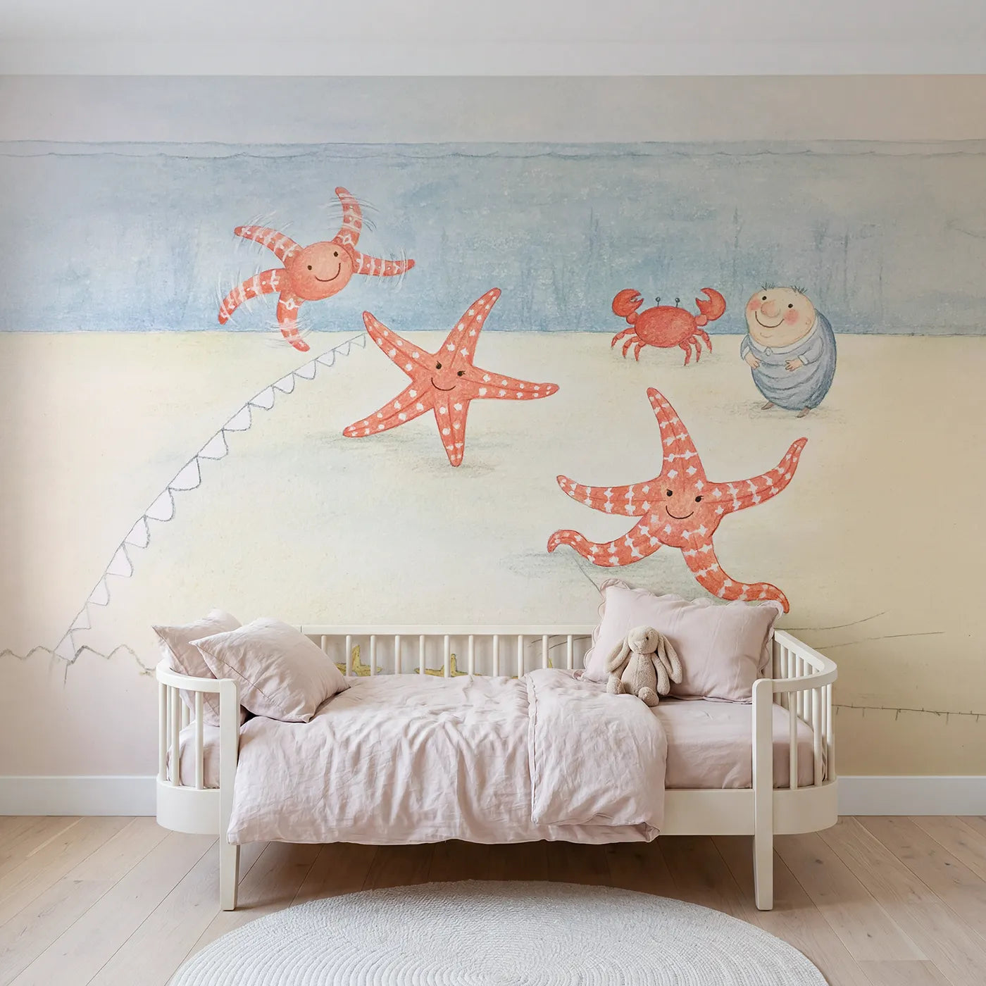 Colored Pencil starfish cartwheel contest on sand, wall mural for a shared kids room by Whimsy Tots