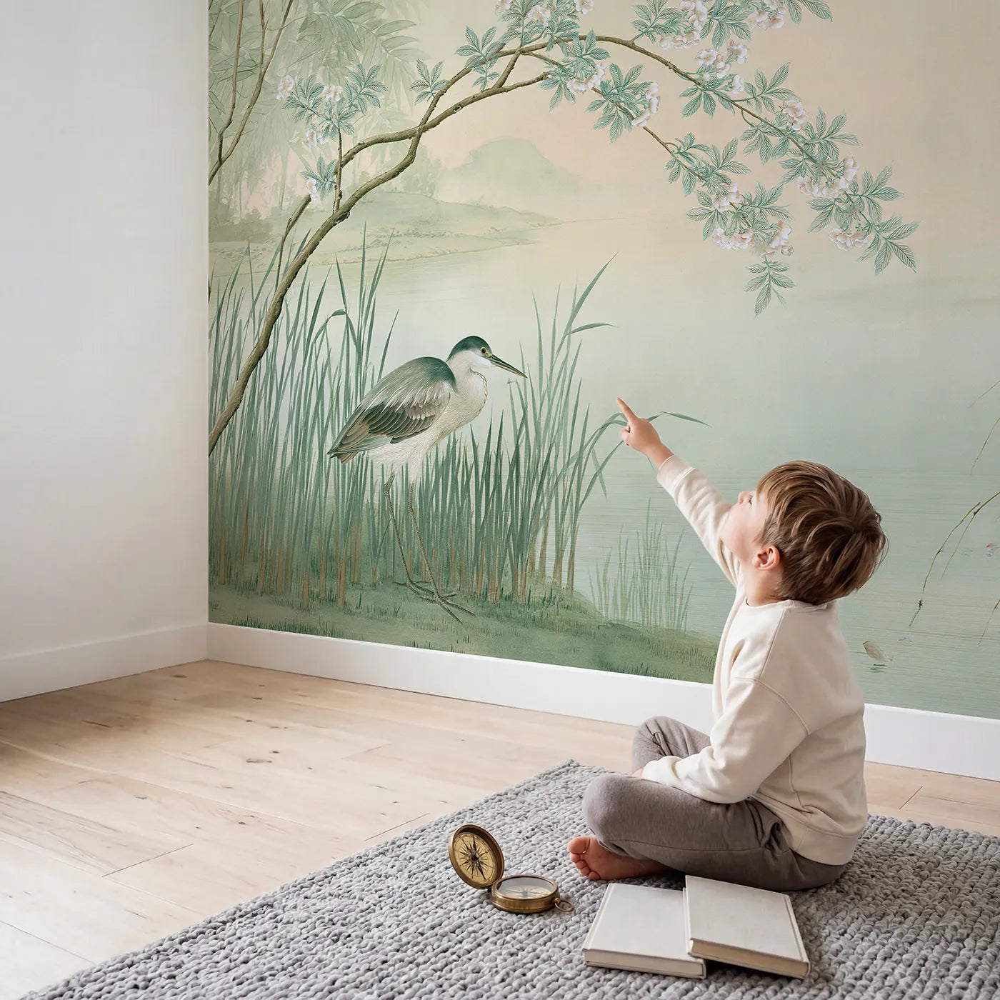 Child in nursery with Heron Reed Branch Wallpaper Mural by Whimsy Tots