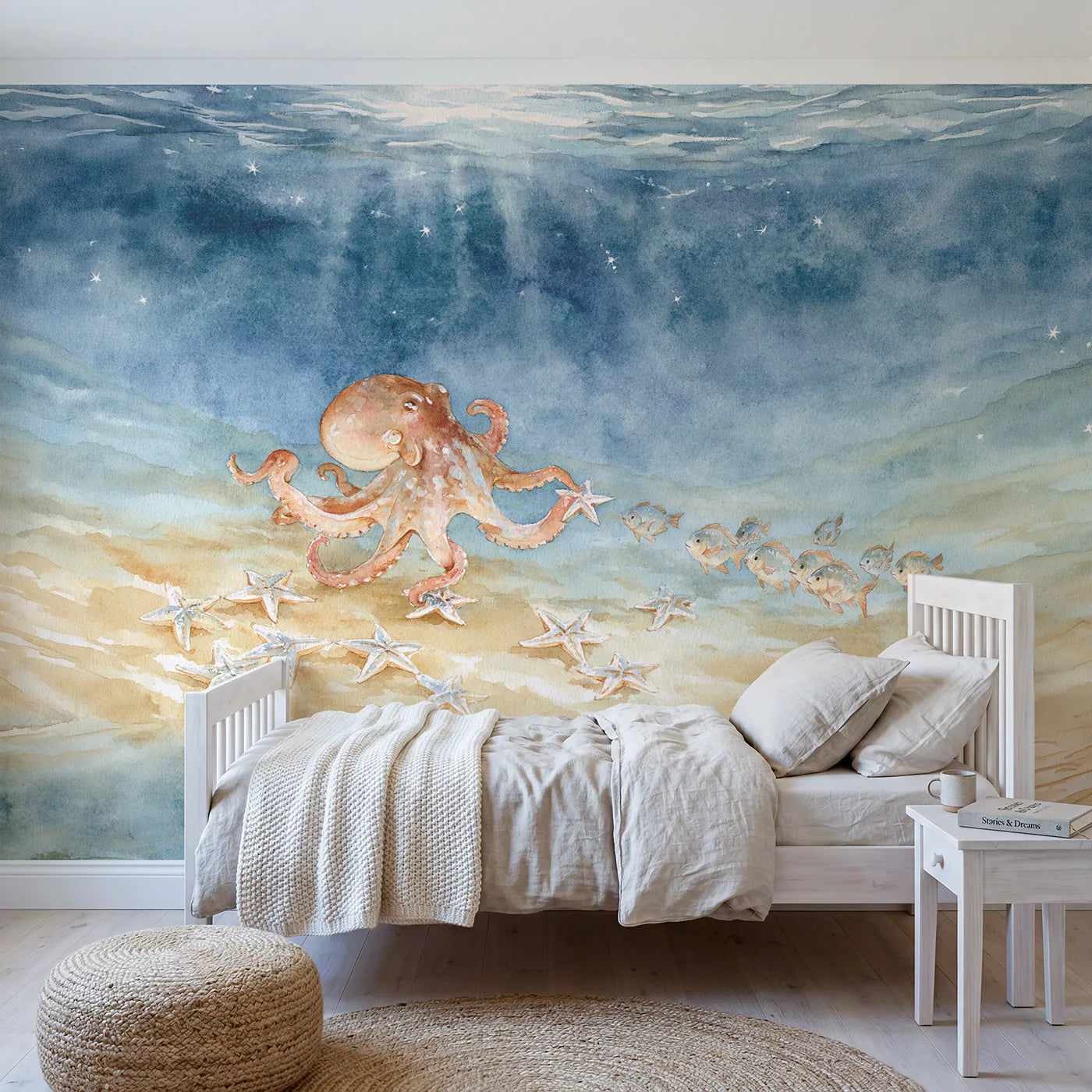 Watercolor octopus arranging starfish constellations, wall mural for a bedroom by Whimsy Tots