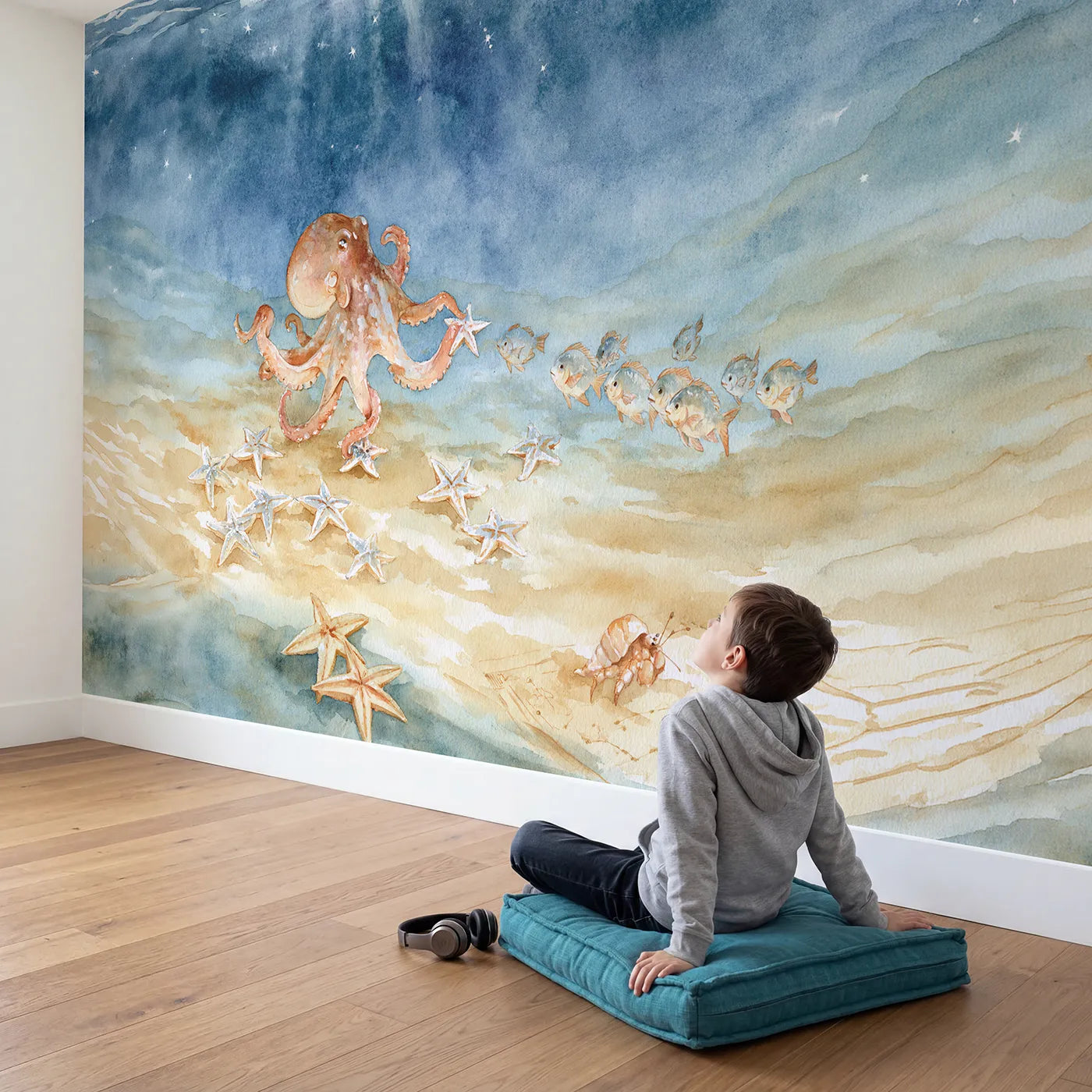 Child in nursery with The Starfish Star Chart Wallpaper Mural by Whimsy Tots