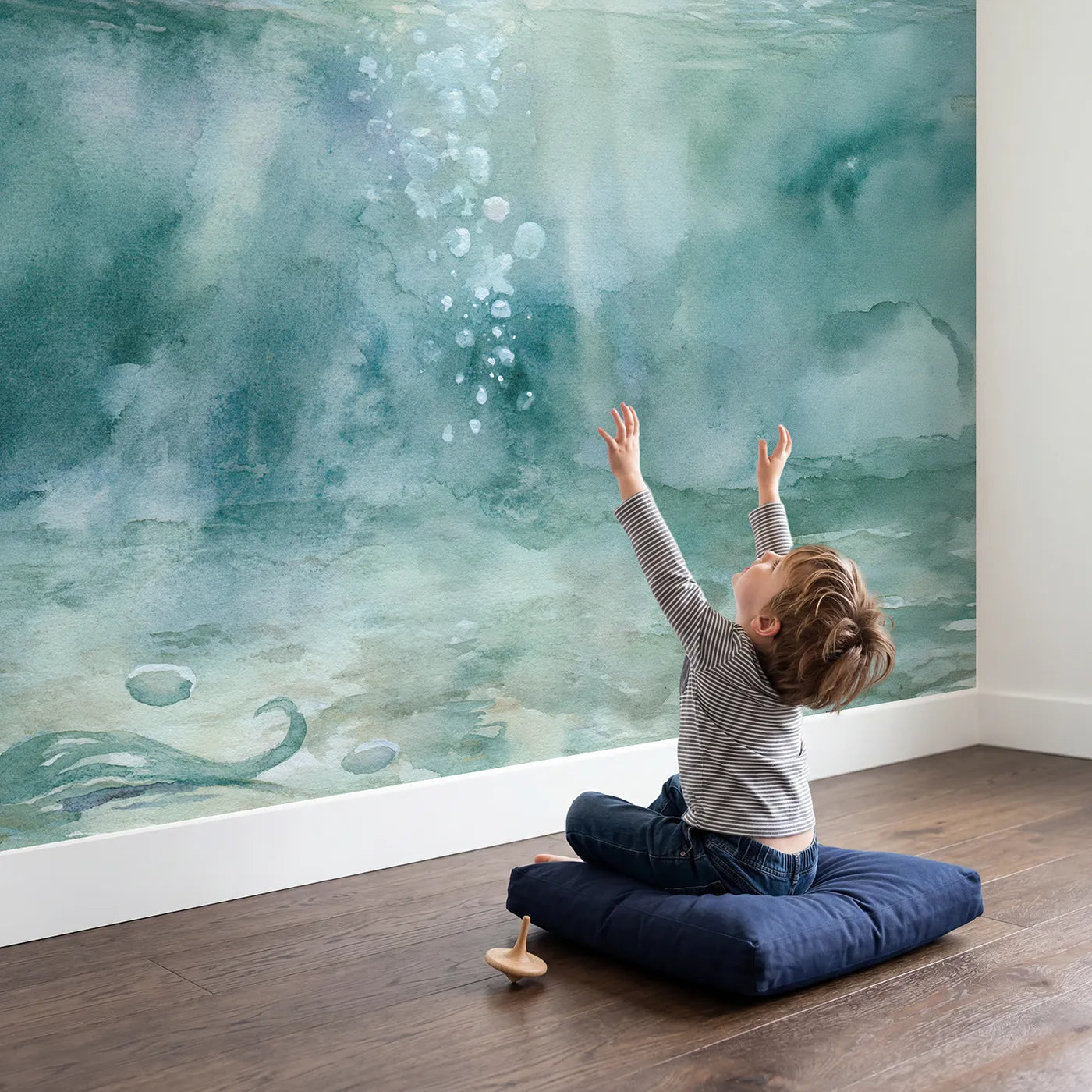 Child in nursery with Gentle Bubble Float Wallpaper Mural by Whimsy Tots