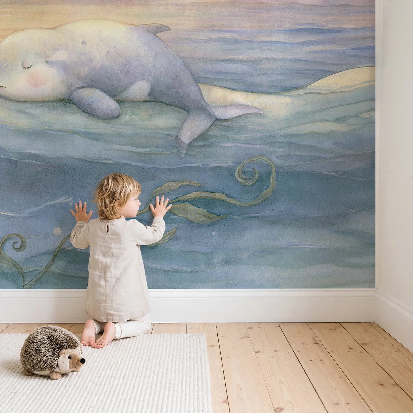 Child in nursery with Goodnight Little Whale Wallpaper Mural by Whimsy Tots