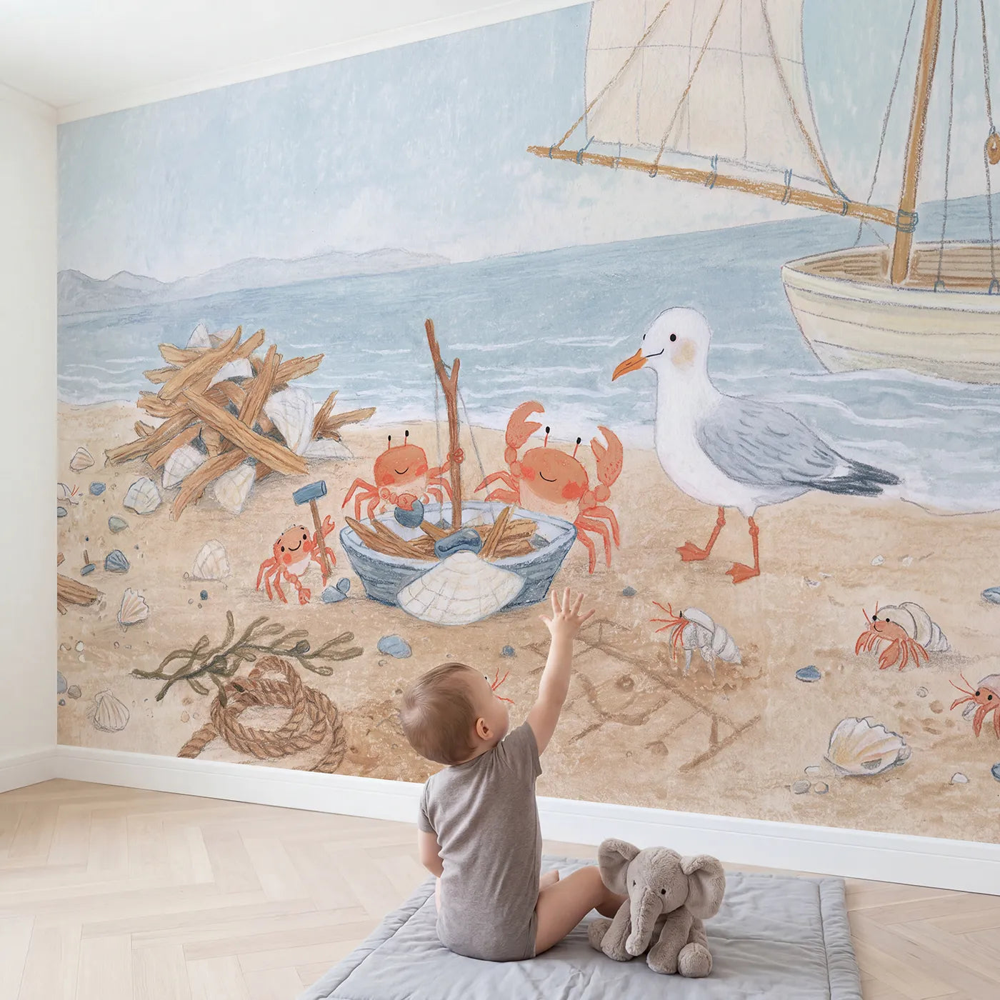 Child in nursery with The Driftwood Boat Builders Wallpaper Mural by Whimsy Tots