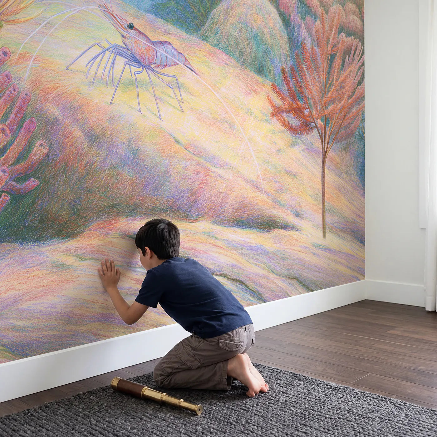 Child in nursery with Little Cleaner Shrimp Wallpaper Mural by Whimsy Tots