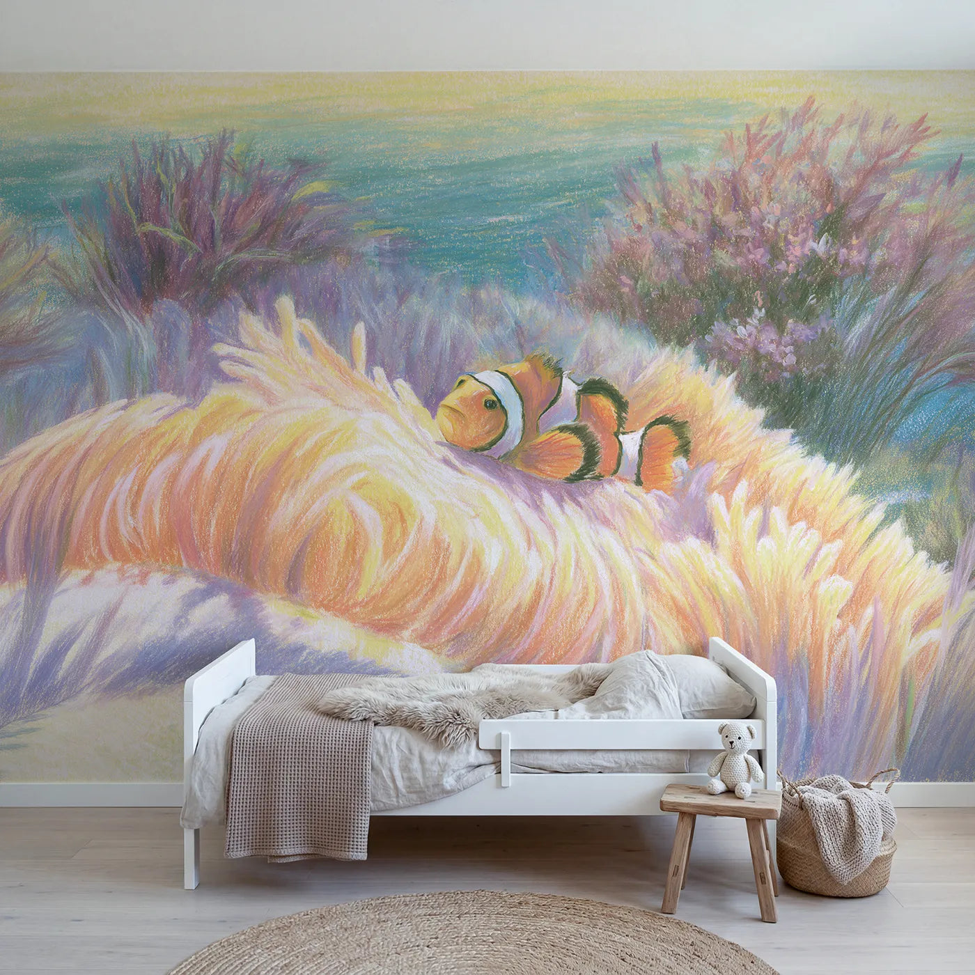 Colored-pencil wall mural of a clownfish and anemone by Whimsy Tots