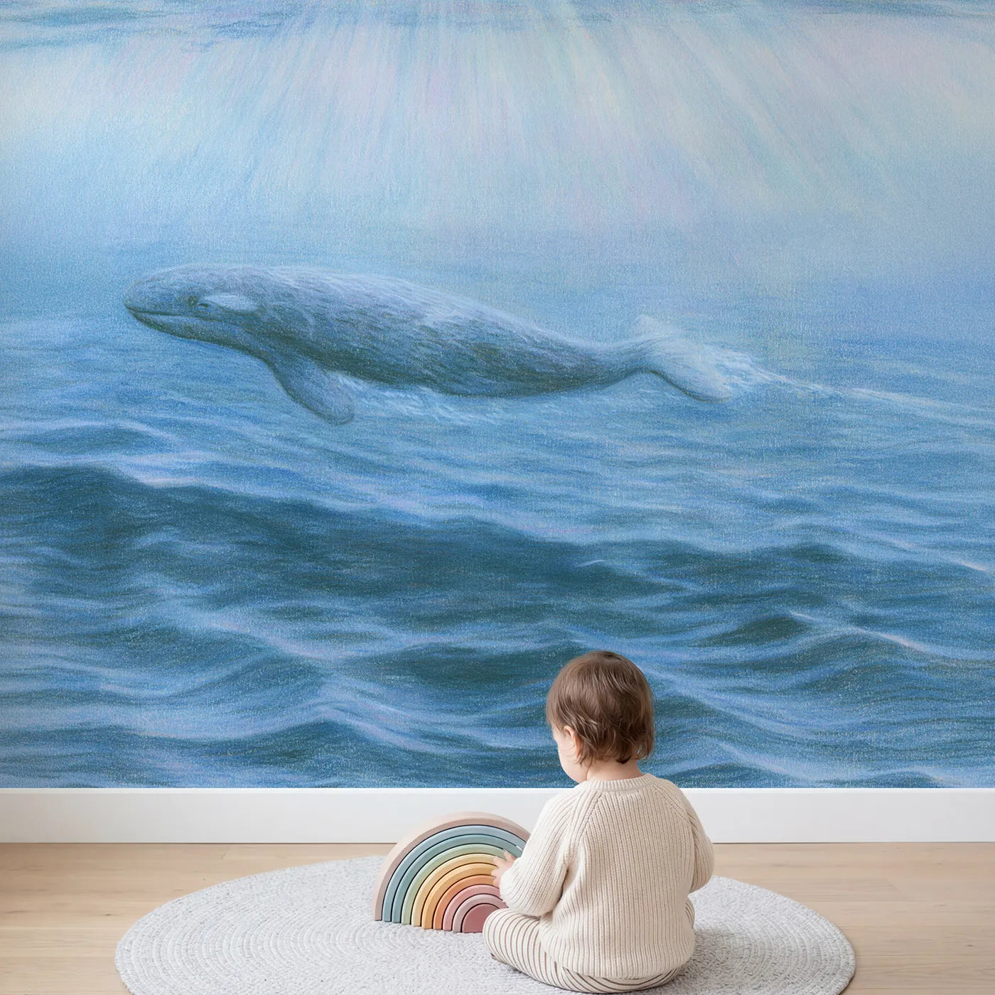 Child in nursery with Baby Whale Calf Wallpaper Mural by Whimsy Tots
