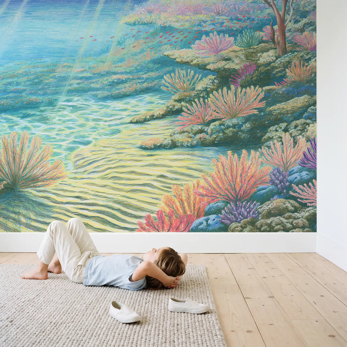 Child in nursery with Sunlit Coral Reef Wallpaper Mural by Whimsy Tots