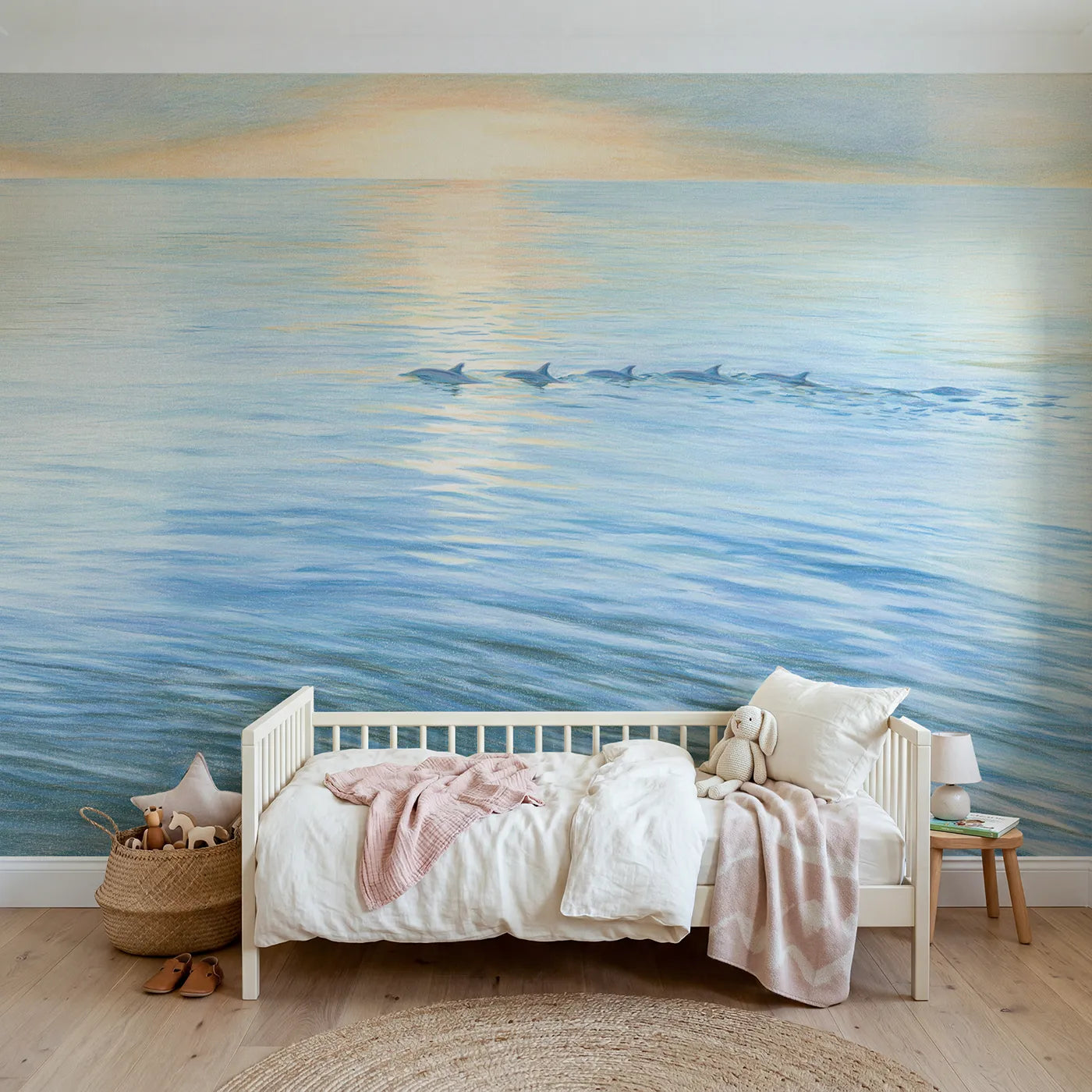 Colored-pencil wall mural of dolphins at the surface by Whimsy Tots