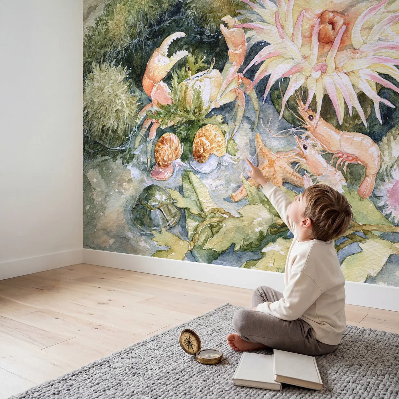 Child in nursery with The Tide Pool Tour Guide Wallpaper Mural by Whimsy Tots