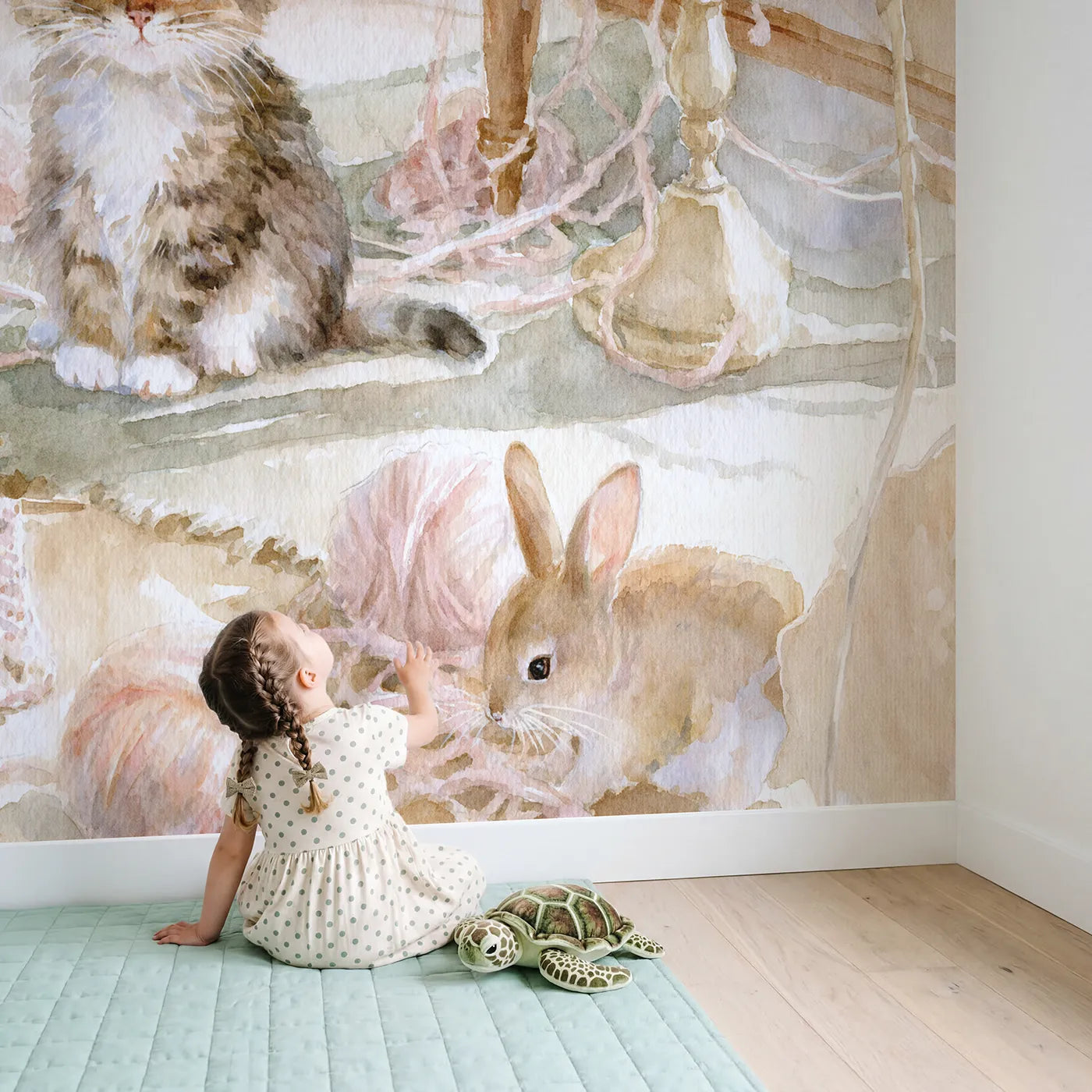 Child in nursery with The Great Yarn Unravelling Wallpaper Mural by Whimsy Tots