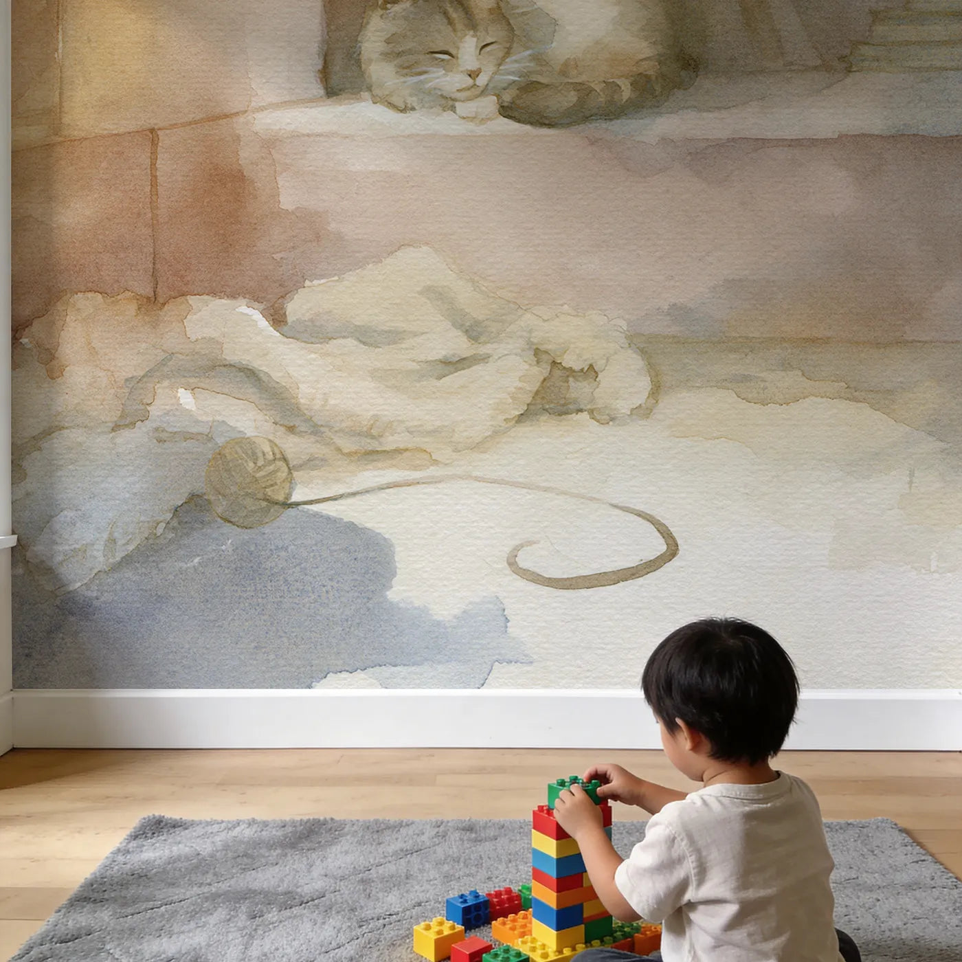 Child in nursery with Cozy Cat Fireside Wallpaper Mural by Whimsy Tots