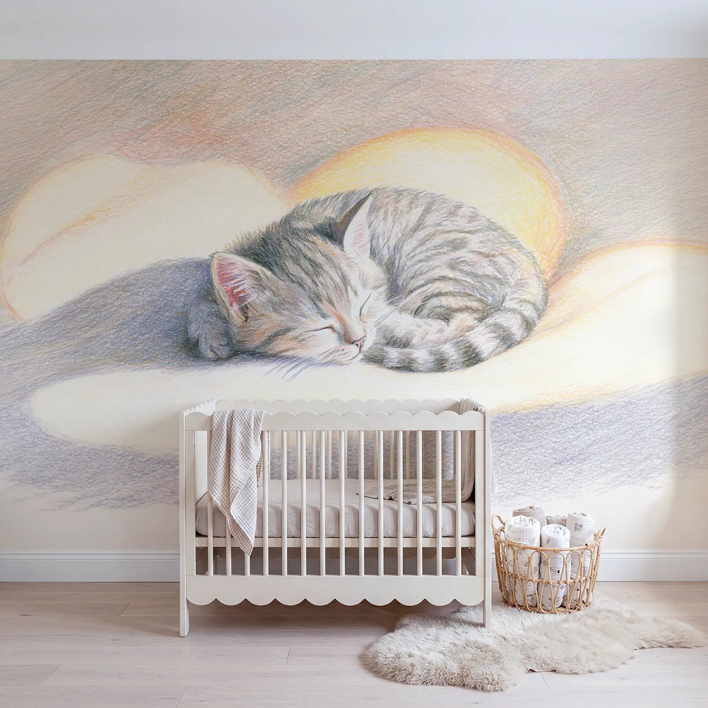 Colored-pencil wall mural of a sleepy curled kitten by Whimsy Tots