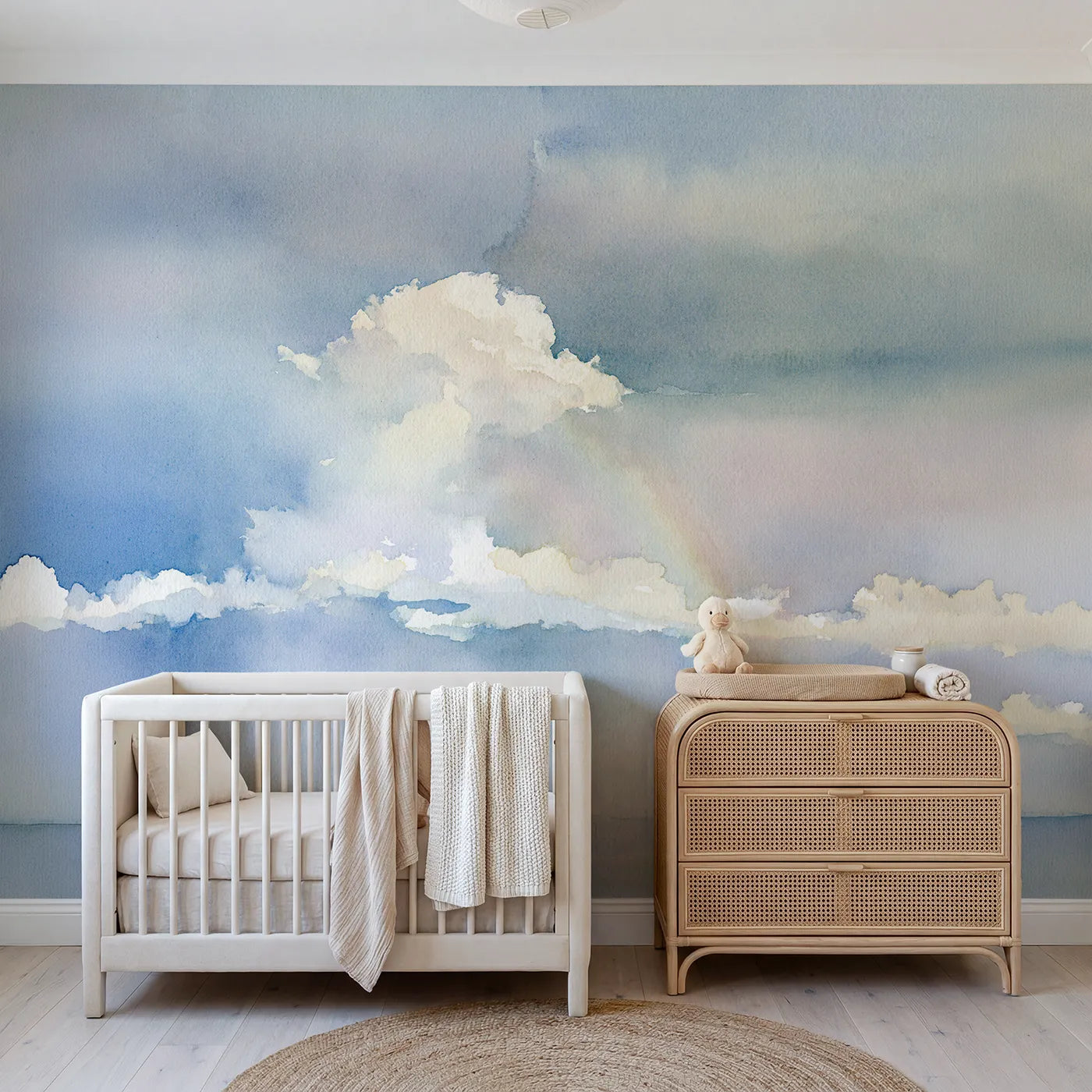 Watercolor wall mural of soft drifting clouds by Whimsy Tots
