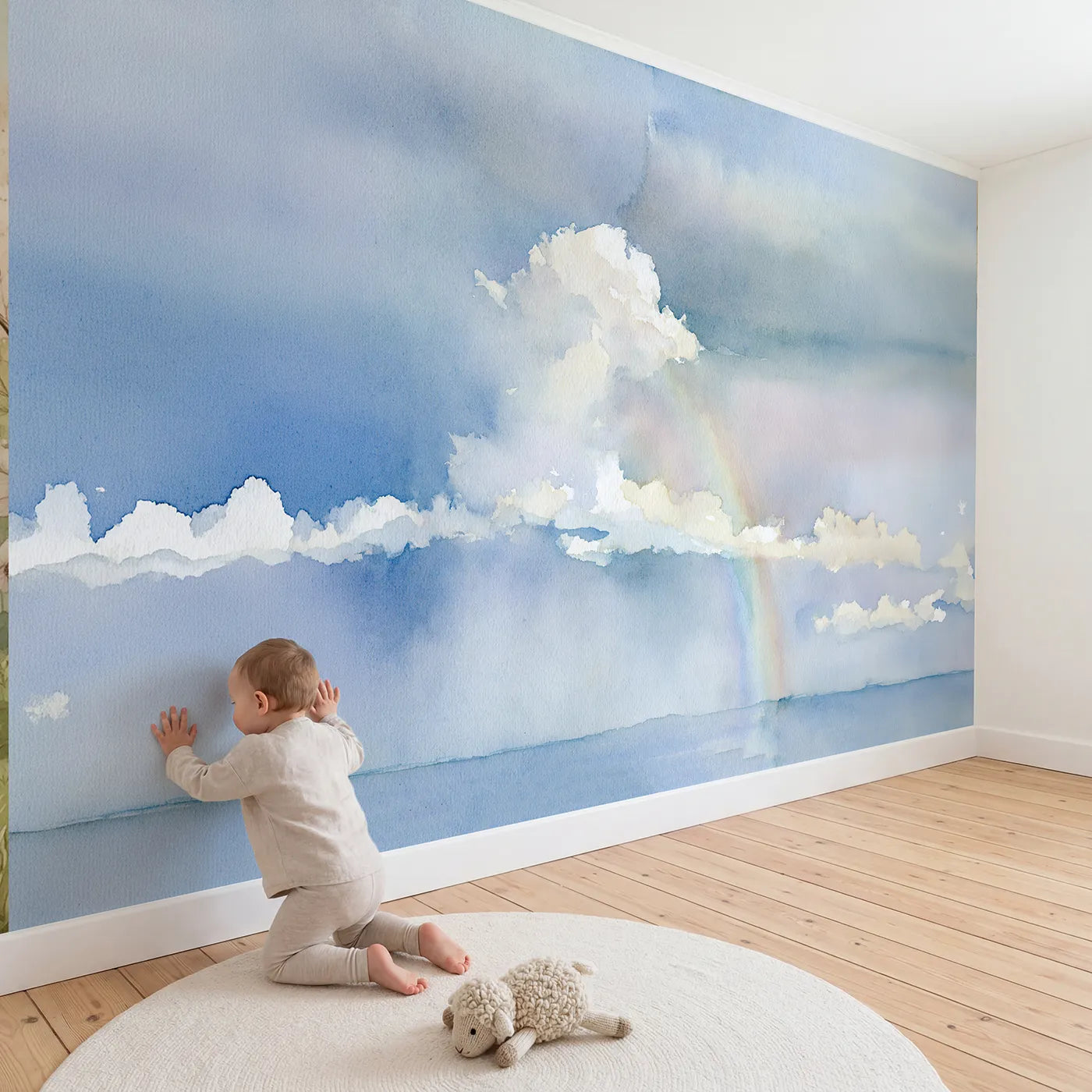 Child in nursery with Midday Rainbow Shower Wallpaper Mural by Whimsy Tots