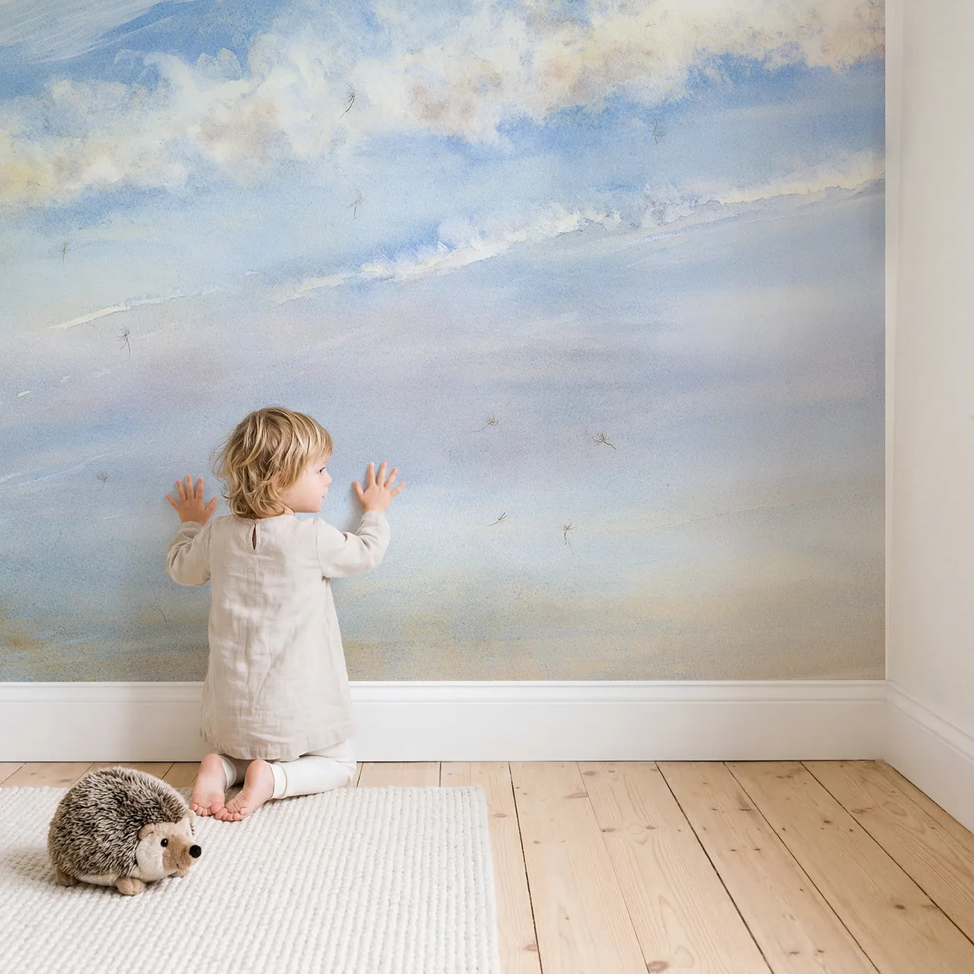 Child in nursery with Midday Cirrus Wisps Sky Wallpaper Mural by Whimsy Tots