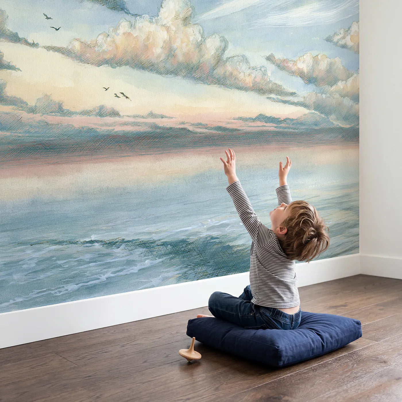 Child in nursery with Morning Cirrus Wisps Sky Wallpaper Mural by Whimsy Tots