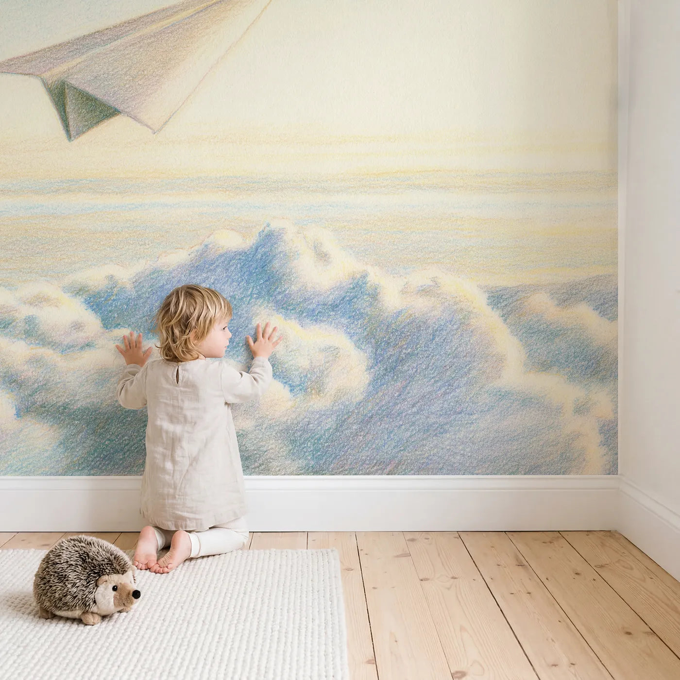 Child in nursery with Gentle Paper Plane Wallpaper Mural by Whimsy Tots