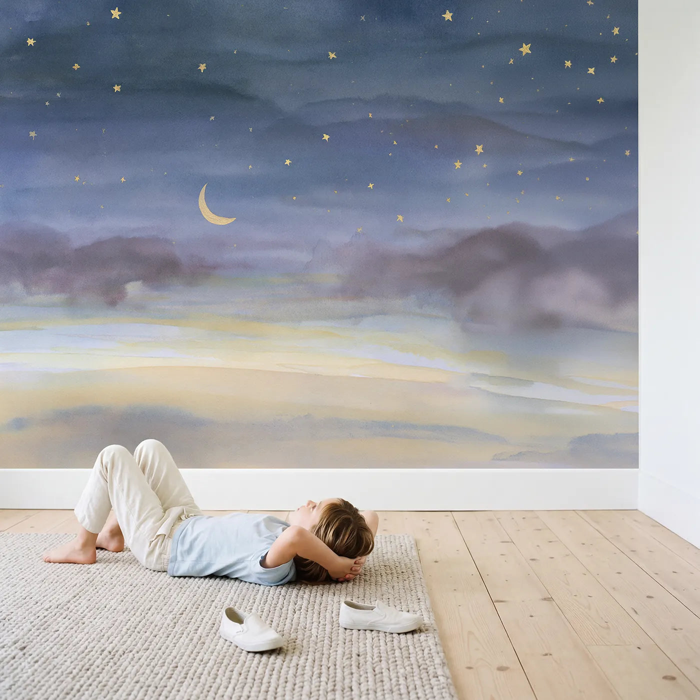Child in nursery with Soft Starry Night Wallpaper Mural by Whimsy Tots