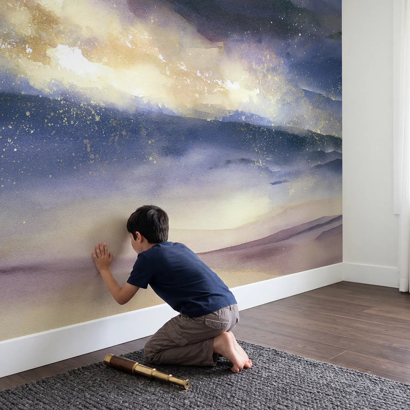 Child in nursery with Gentle Galaxy Glow Wallpaper Mural by Whimsy Tots
