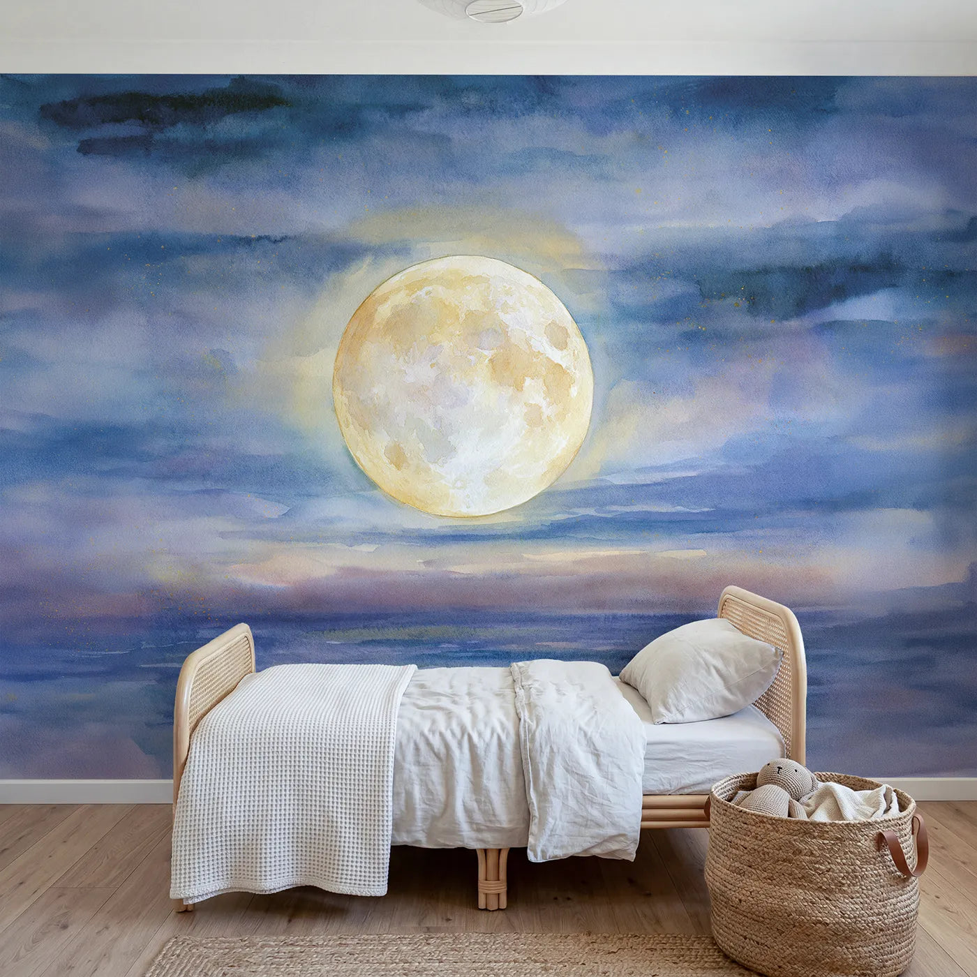 Watercolor wall mural of a detailed glowing full moon by Whimsy Tots