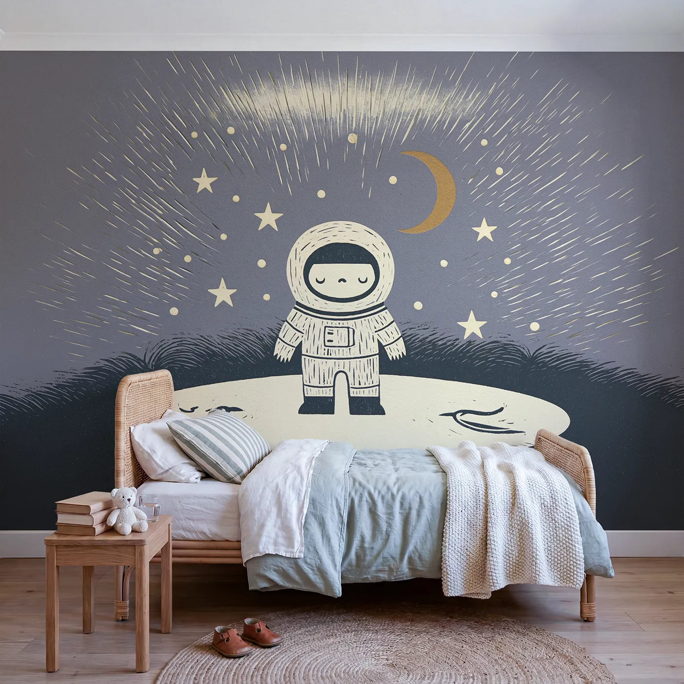 Linocut wall mural of an astronaut and crescent moon by Whimsy Tots
