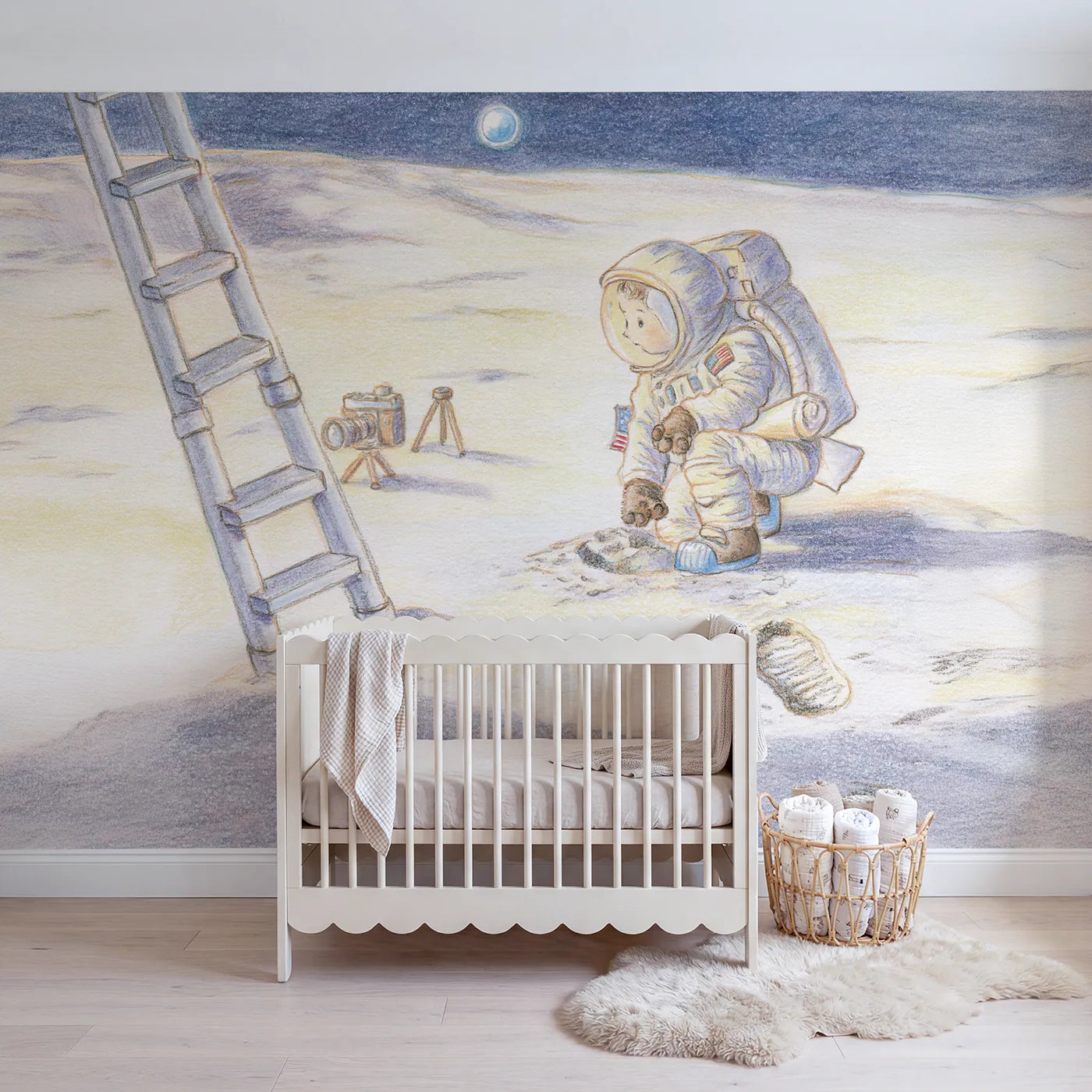 Colored Pencil astronaut beside the first moon footprint, mural for a big-kid bedroom by Whimsy Tots