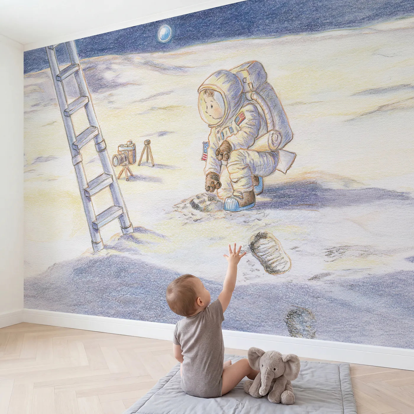 Child in nursery with The First Footprint Wallpaper Mural by Whimsy Tots